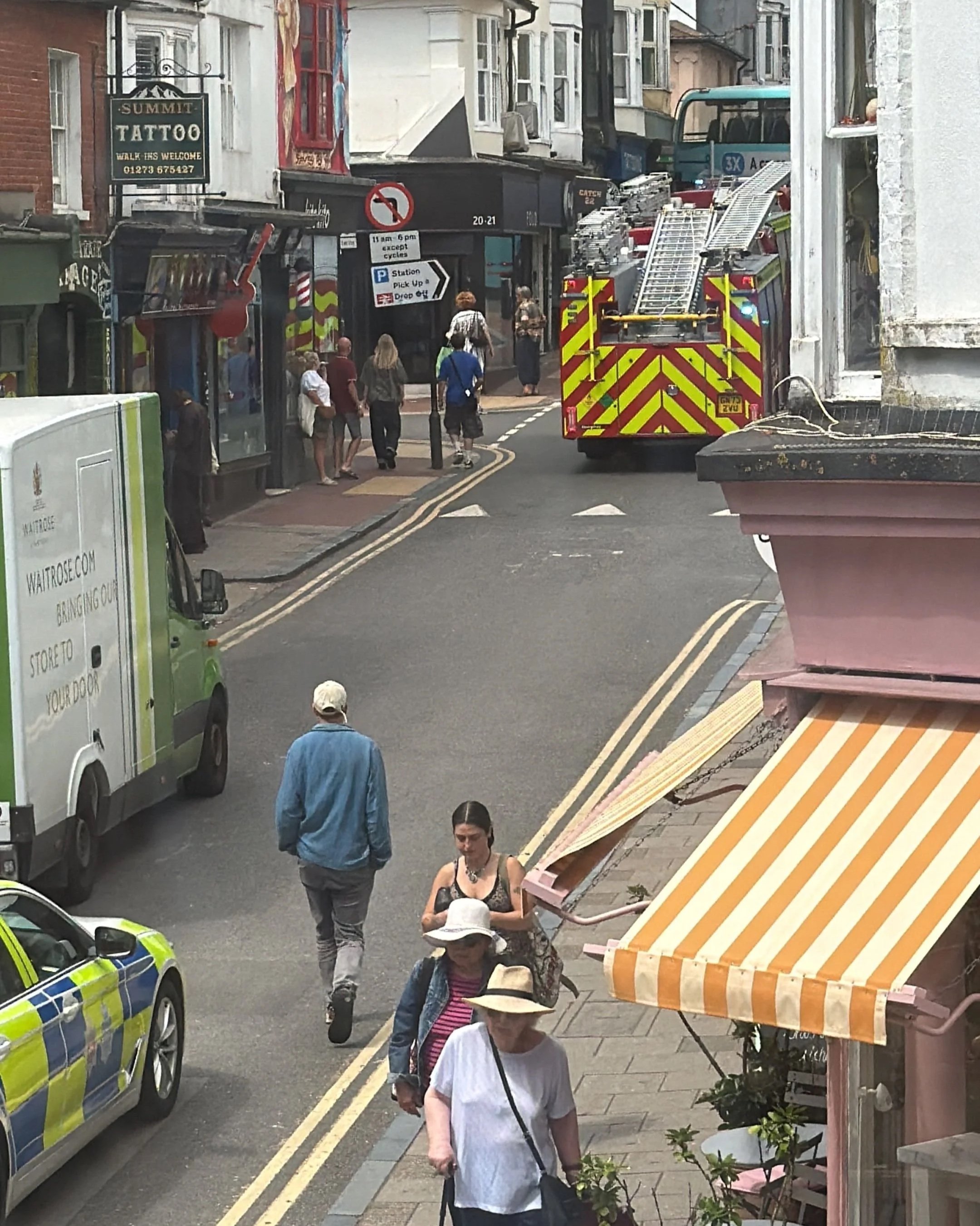 A fire engine and police car on Trafalgar Street in Brighton near the scene of the bus collision