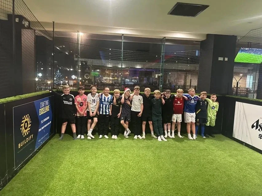 A group session on the pitch at Ball Park Brighton Marina