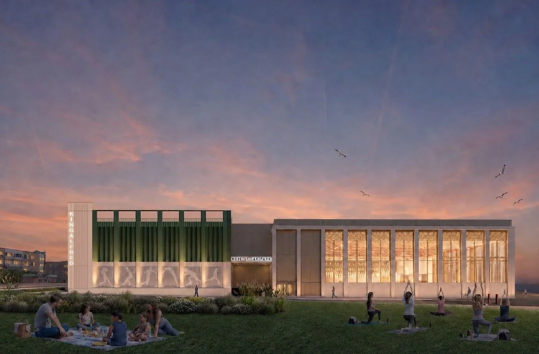 New King Alfred Leisure Centre west elevation lit at night on Hove seafront