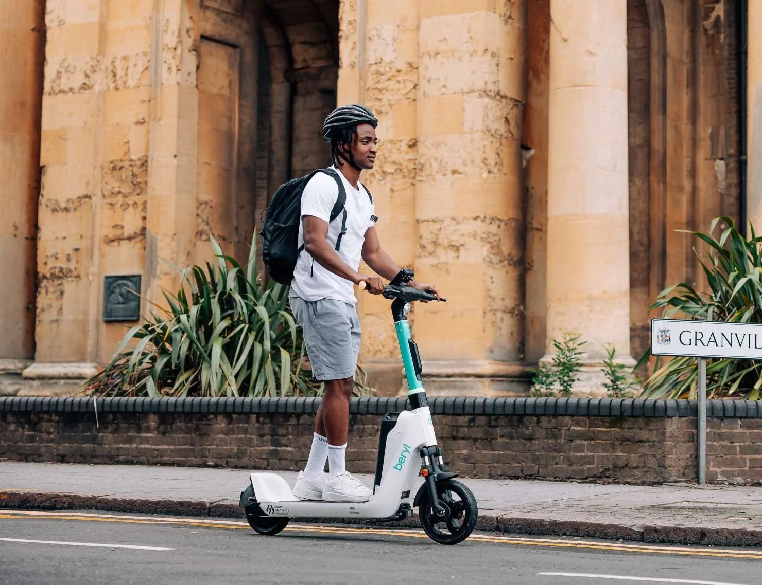 Beryl e-scooter rider travelling along a Brighton street