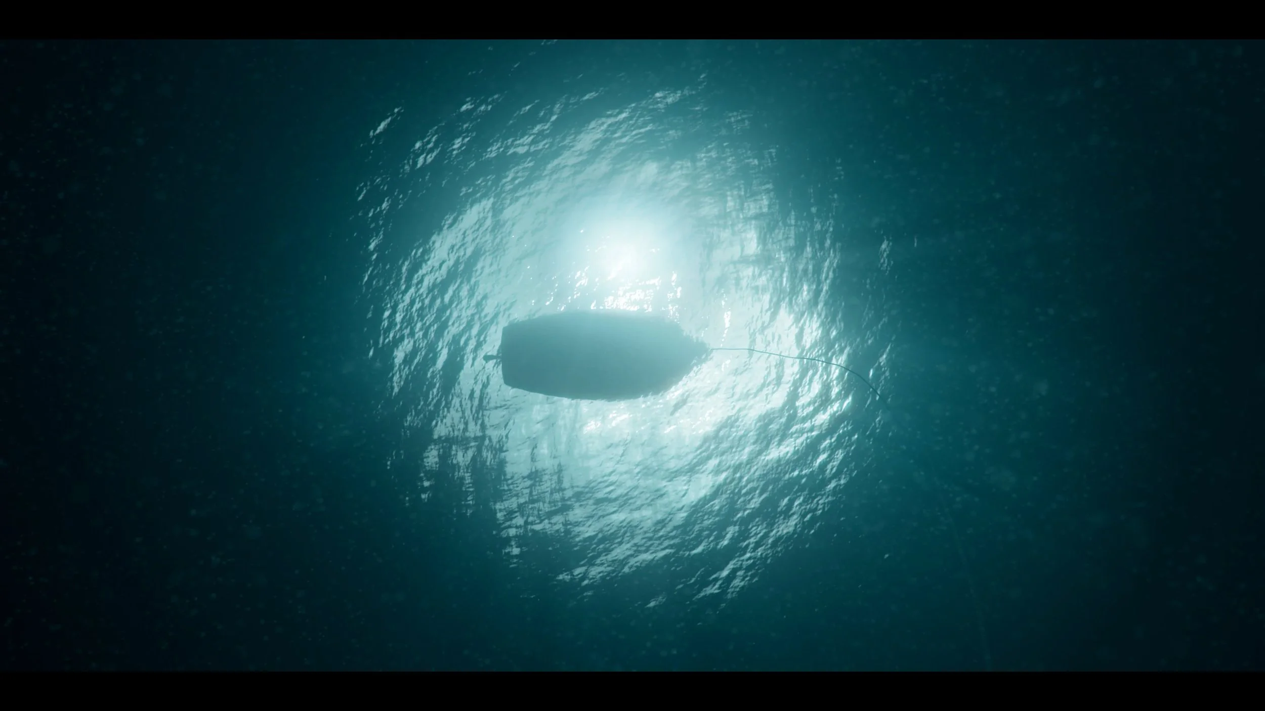 View of an underwater scene with a boat and its anchor, seen from below as water ripples around.