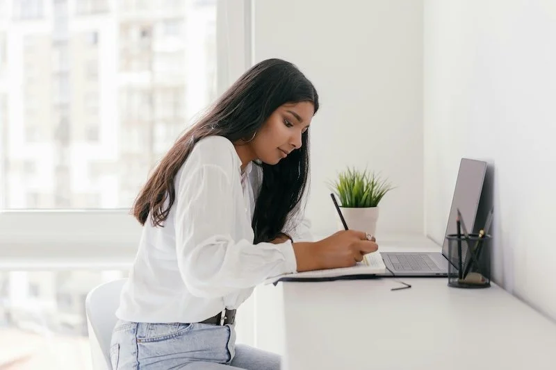 Woman having online therapy with Blossom Within