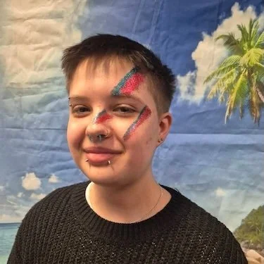 Boy with glitter at Womanifest - square.jpeg