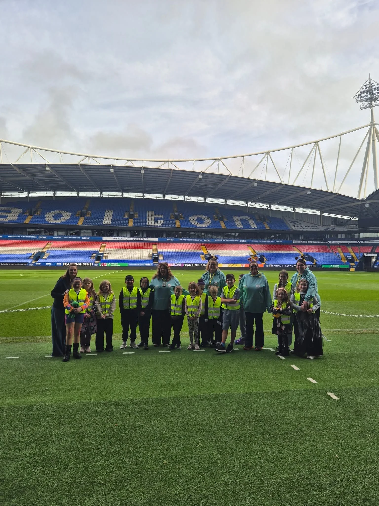 A group of children and Helen Wilson at the Big Festoon, October 2025.