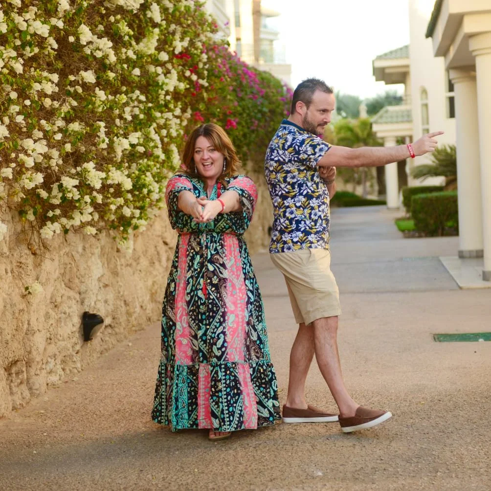 Wes and Helen Wilson posing as James Bond