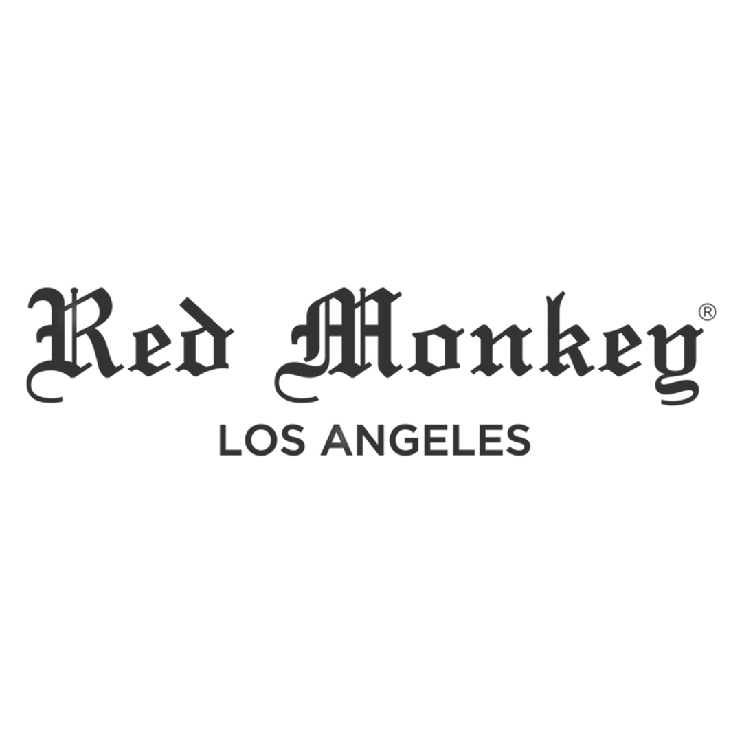 Red Monkey Los Angeles logo with a cartoon monkey wearing sunglasses and a red shirt, standing on a skateboard.