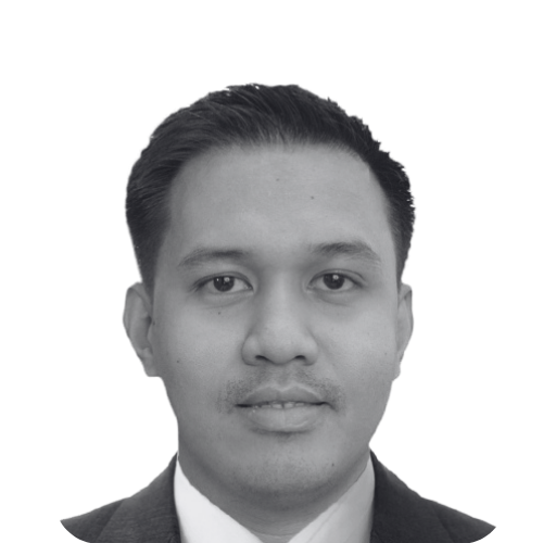 Black and white portrait of a young Asian man with short dark hair, wearing a collared shirt and sweater, smiling slightly.