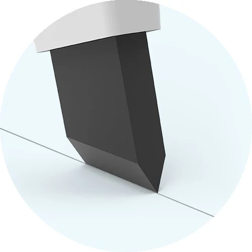 Close-up of a black and white utility knife blade with a silver handle.