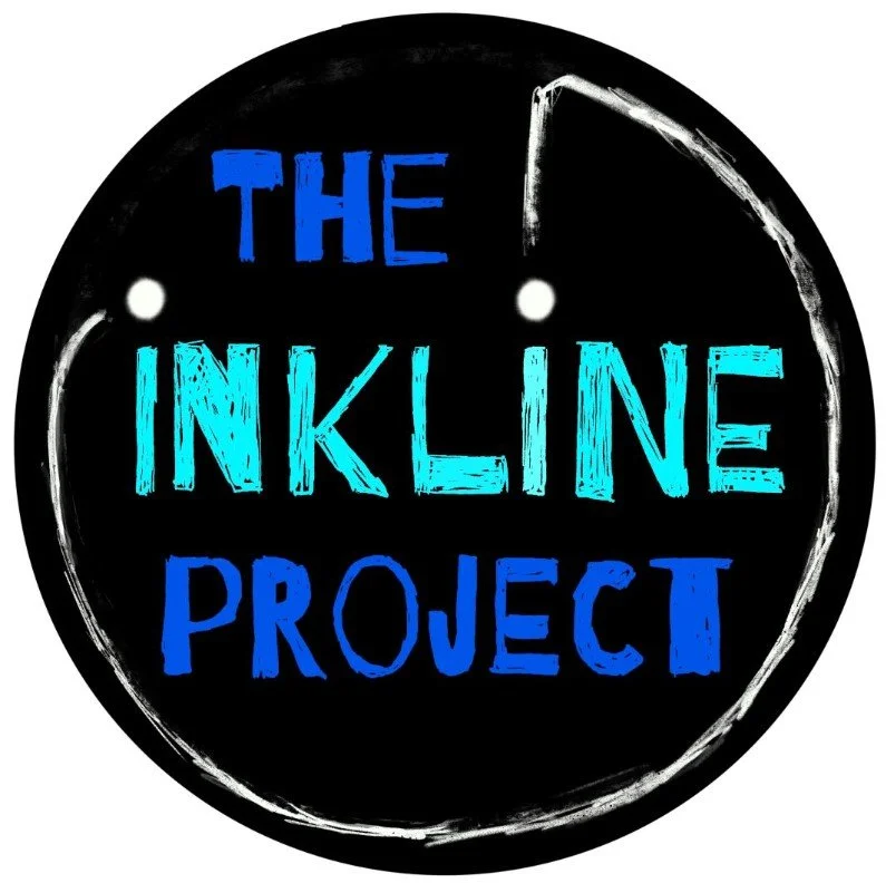 A circular chalkboard with the words "The Inkline Project" written in different shades of blue, with a white chalk outline around the circle.