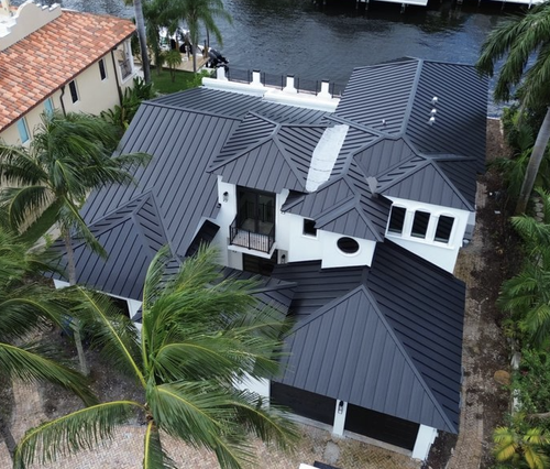 Completed roof replacement by Janus Roofing in Palm Beach County