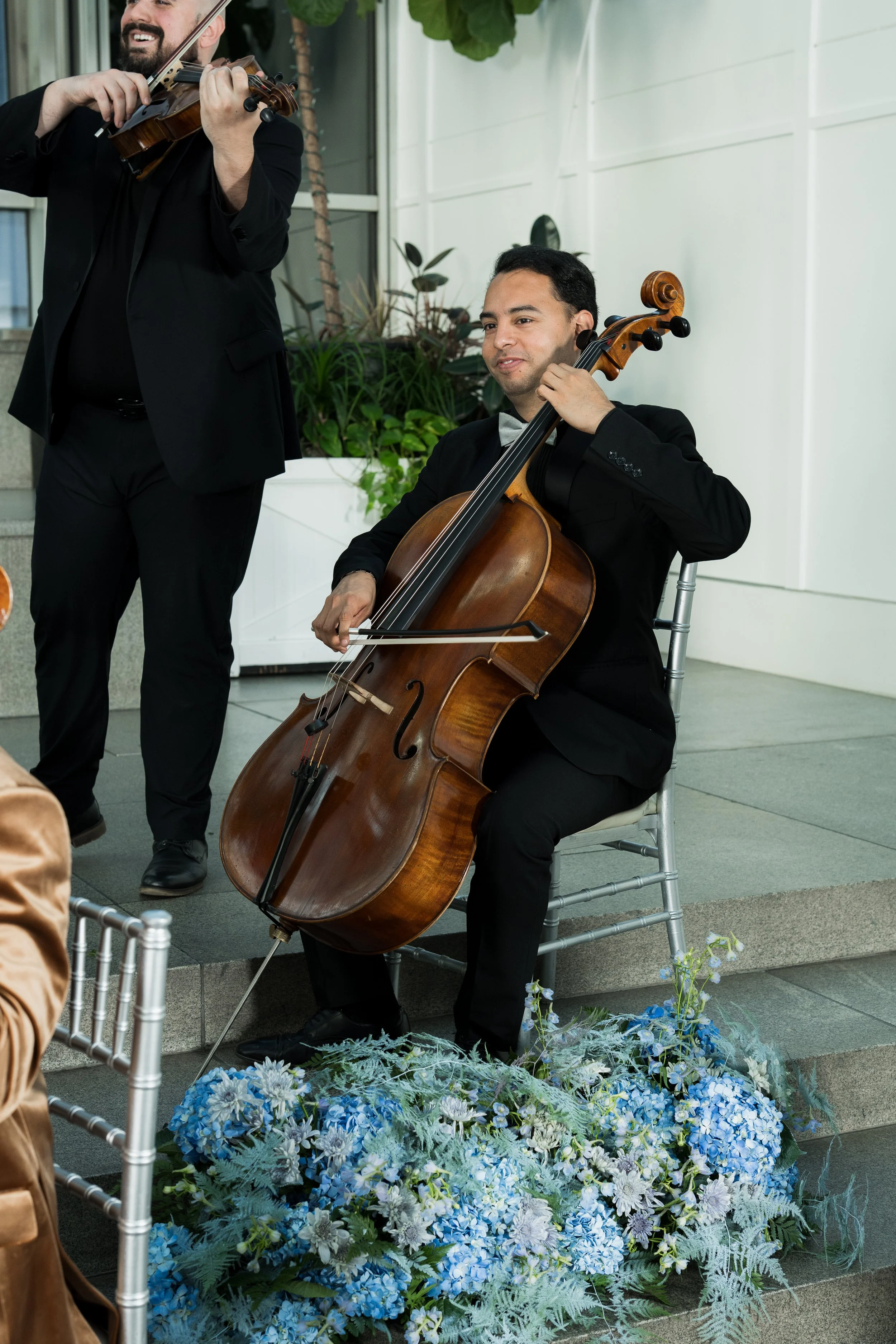 William Garcia playing the cello with Radiant Strings ensemble.