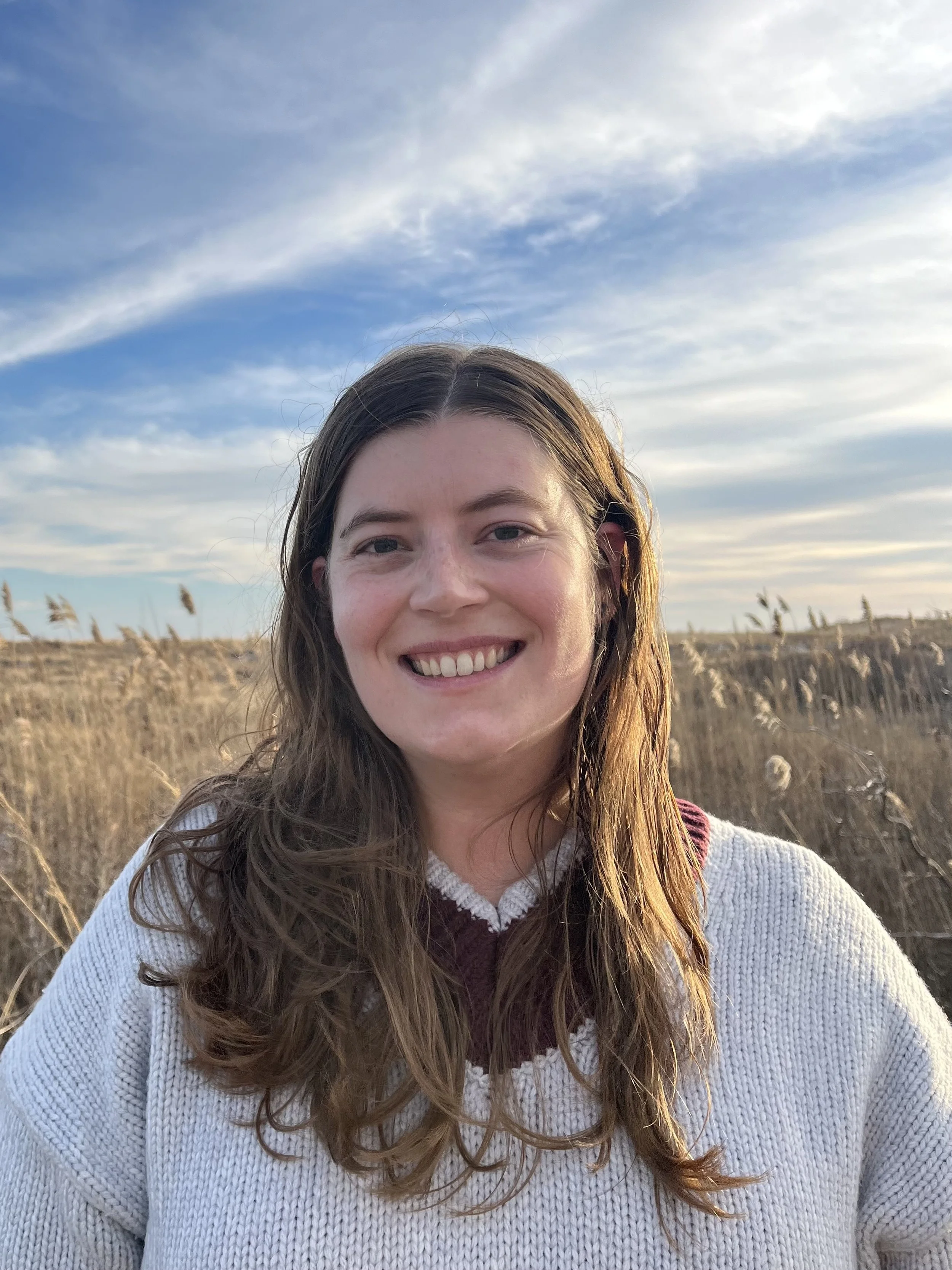 an image of Eve Glynn smiling at the camera