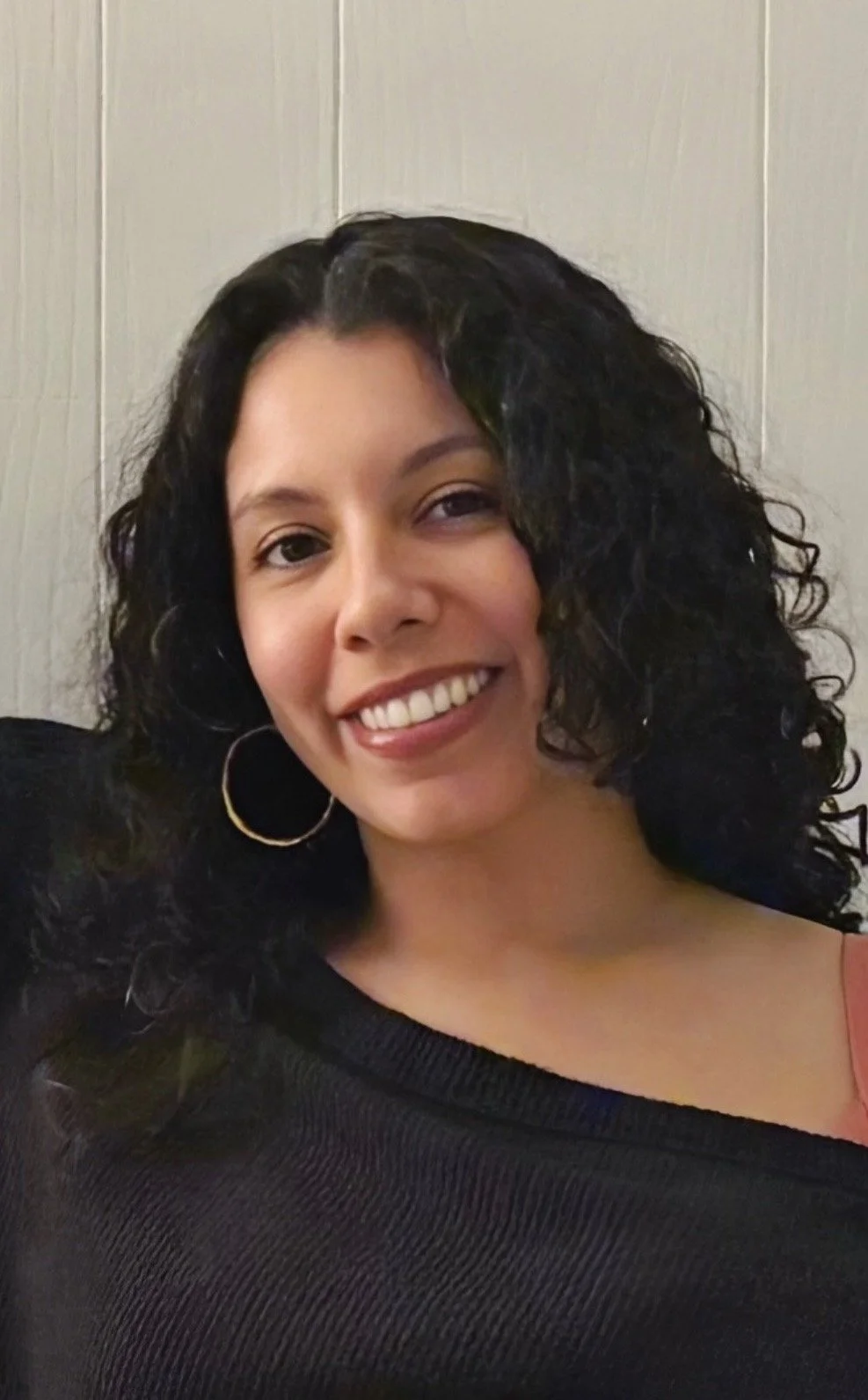 an image of Nicole Calderon smiling at the camera
