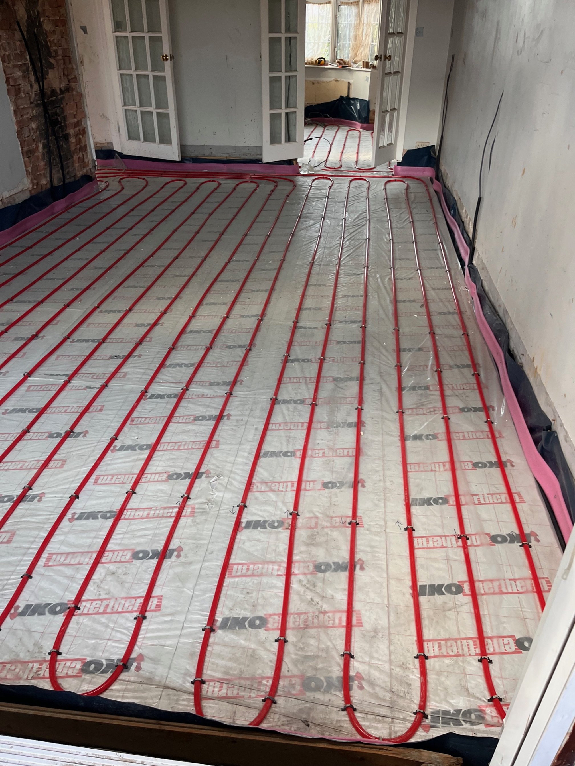 Underfloor heating installation in Bastead