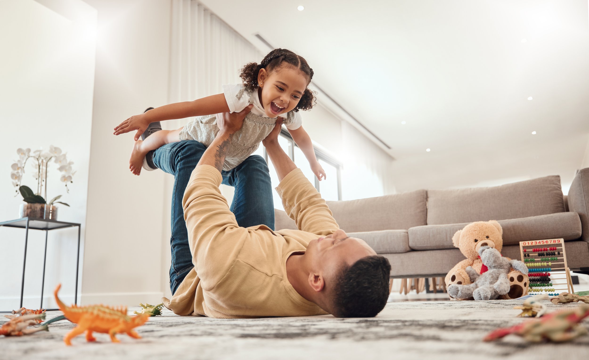 Family playing on the floor after new boiler installation