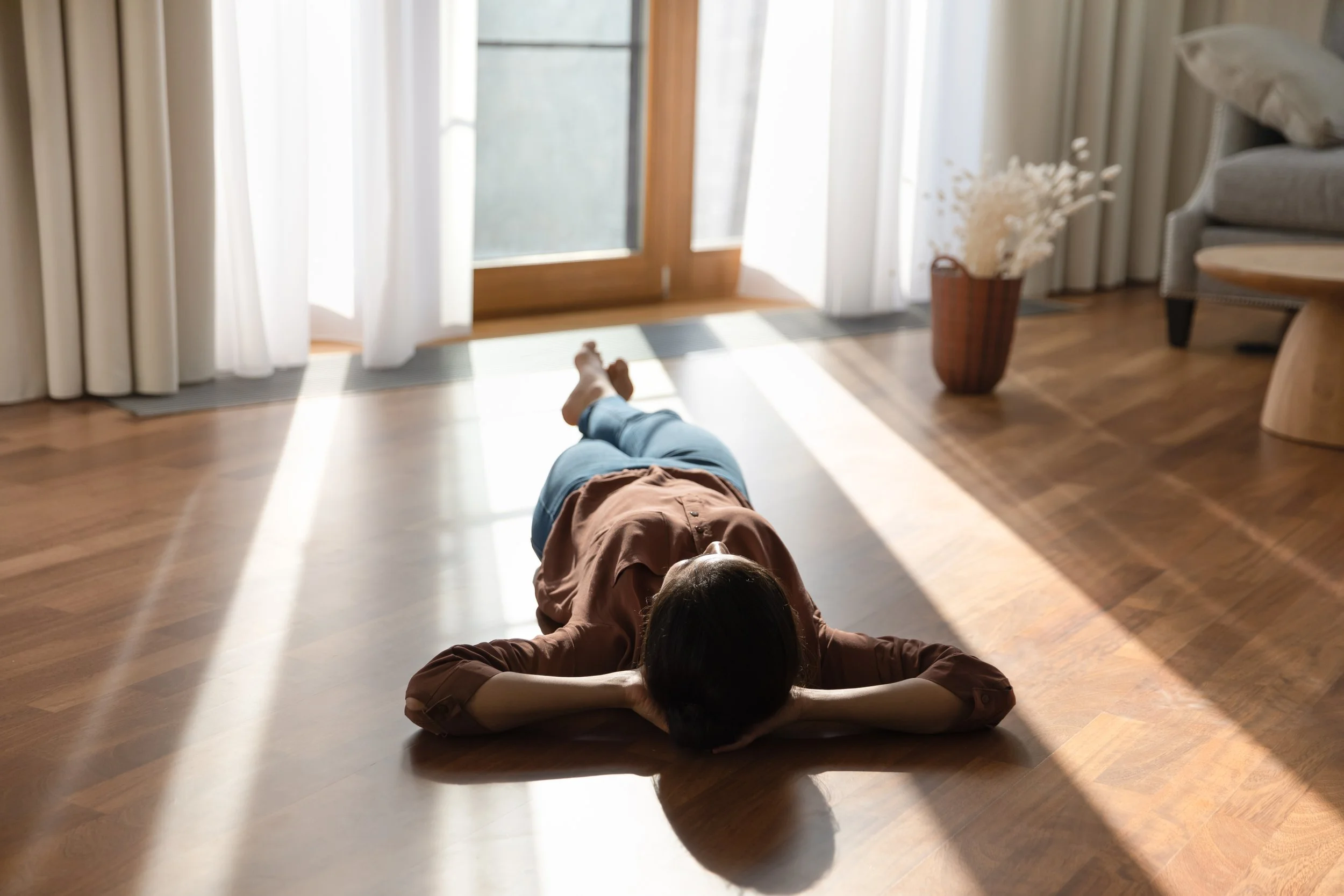 Lady lying on the floor after boiler repair to her flat