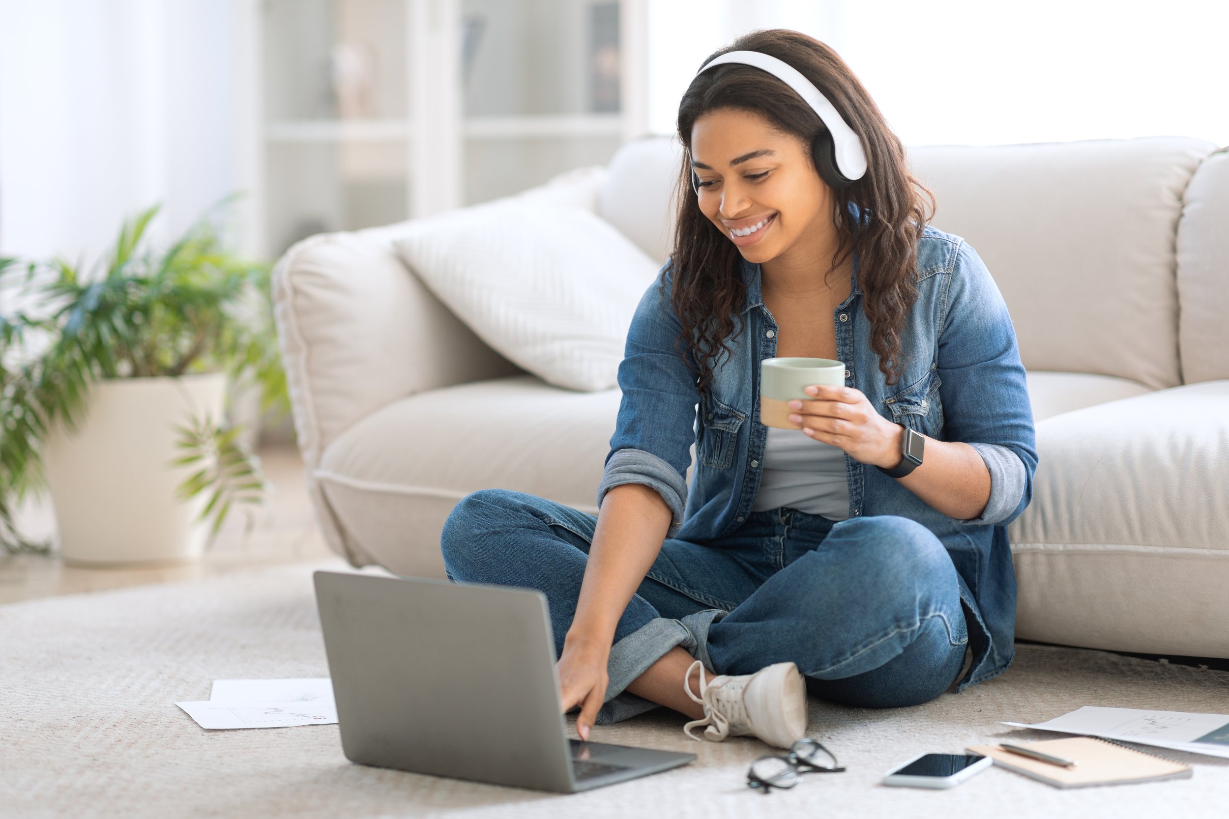 Lady relaxing on the floor after the boiler repair in Raynes Park