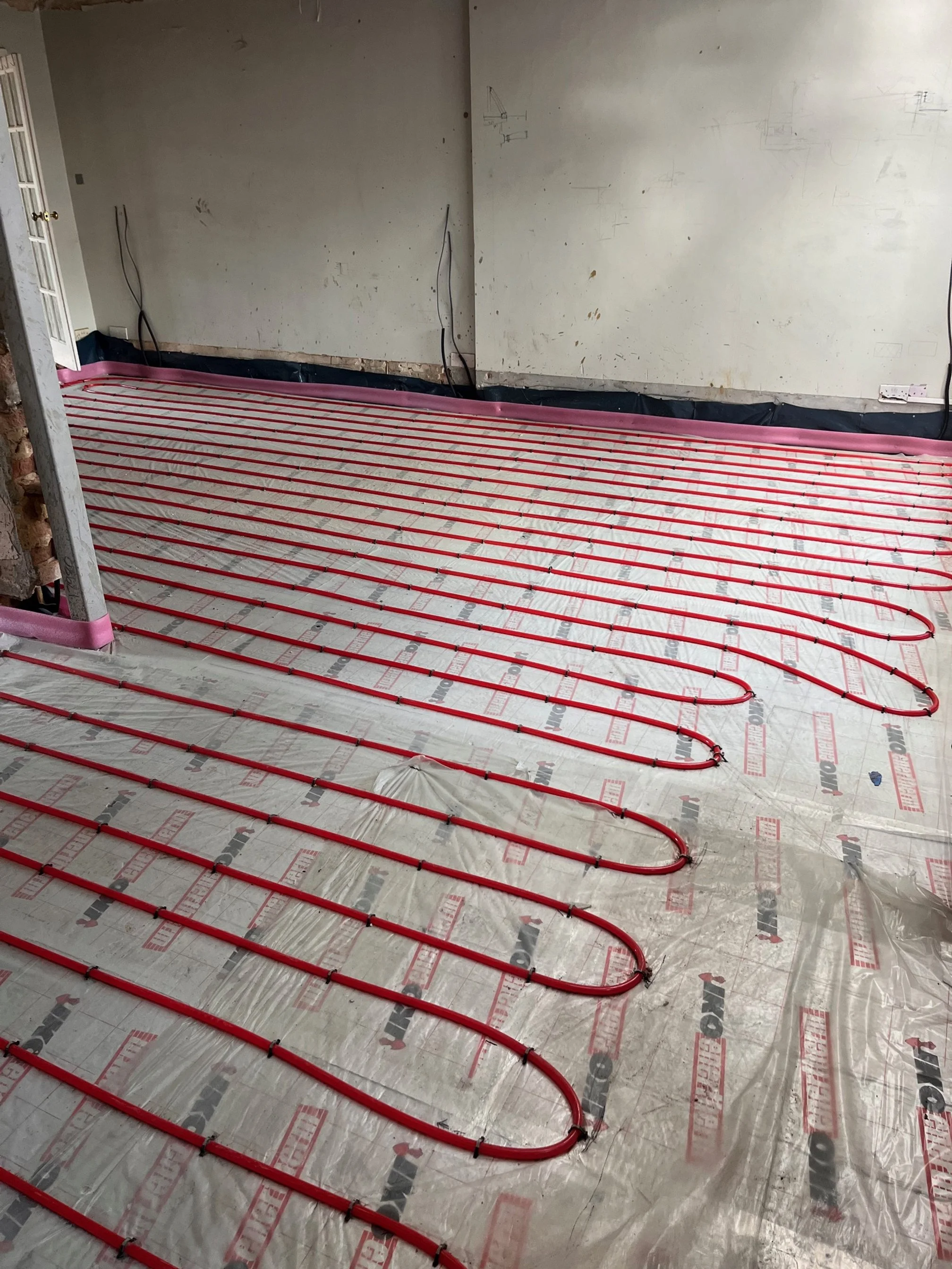 Underfloor heating installation in Bastead
