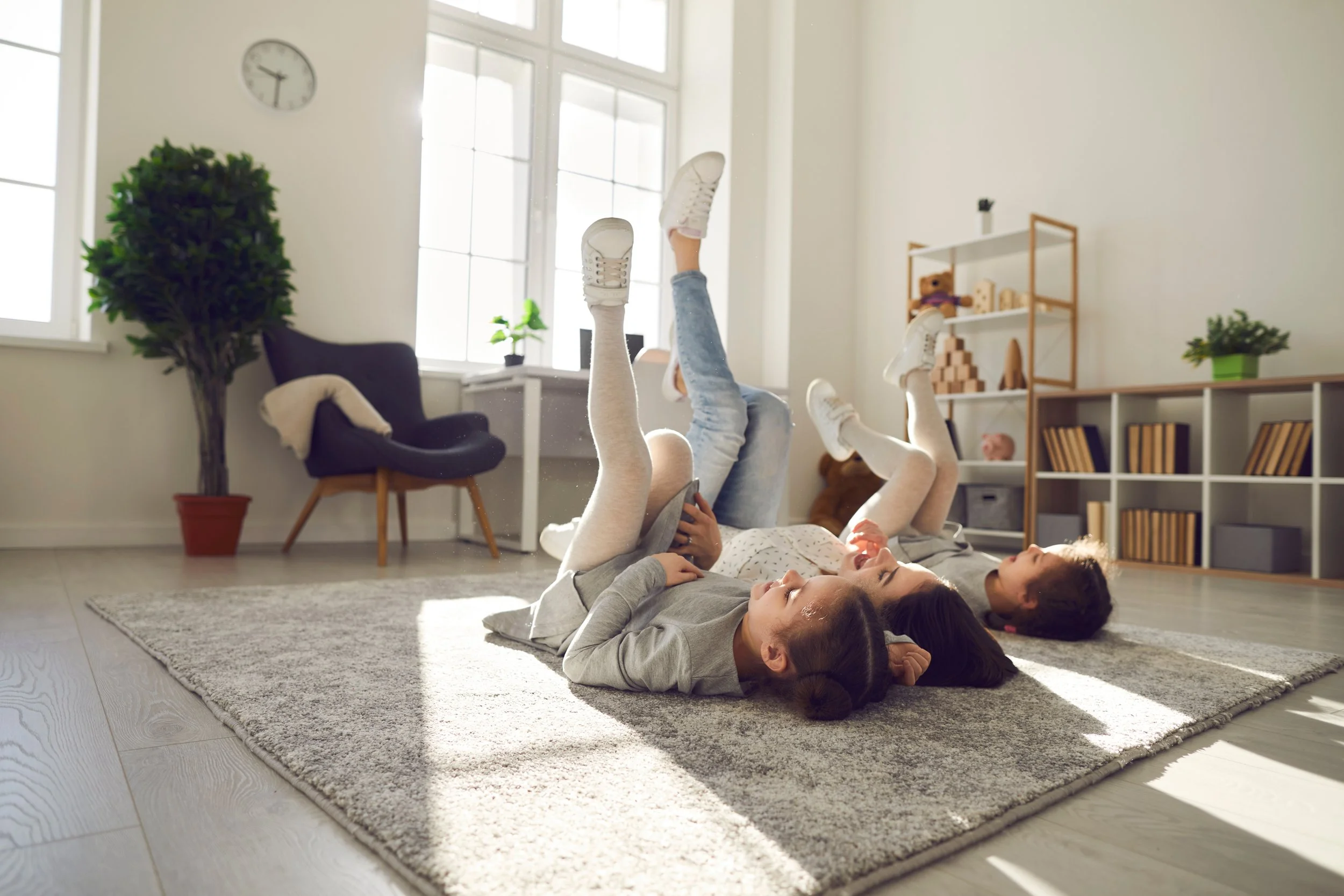 Children lying on the floor after central heating repair