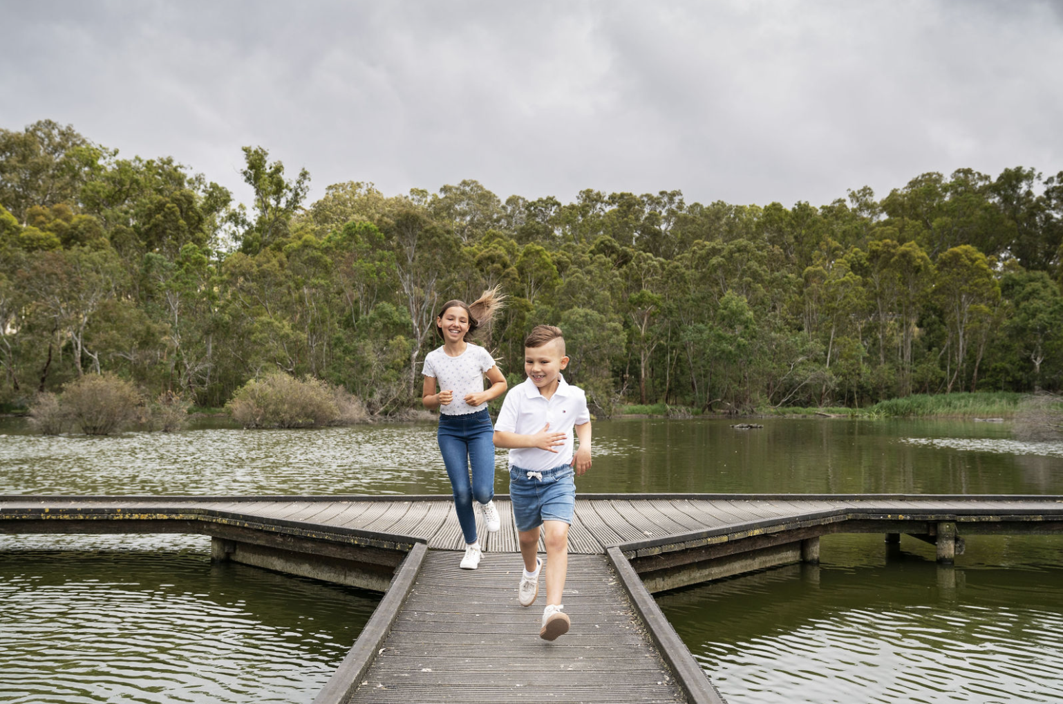 kids-running-on-bridge-kasija-model-glenlea-estate-photoshoot-advertisment