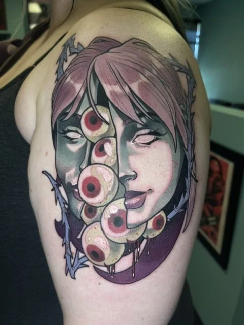 Lady Face Split with Eyeballs Tattoo