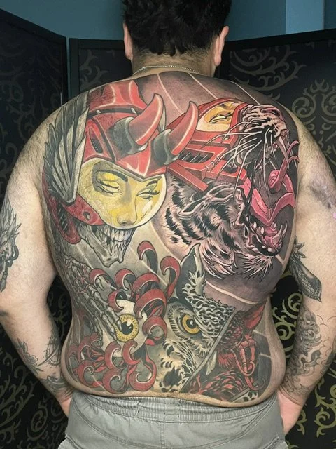 Weird Fun Backpiece Tattoo 