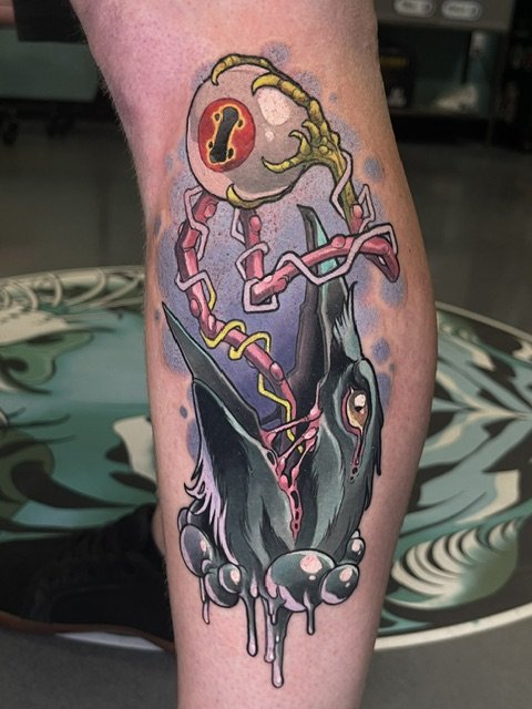Raven with Eyeball Tongue Tattoo