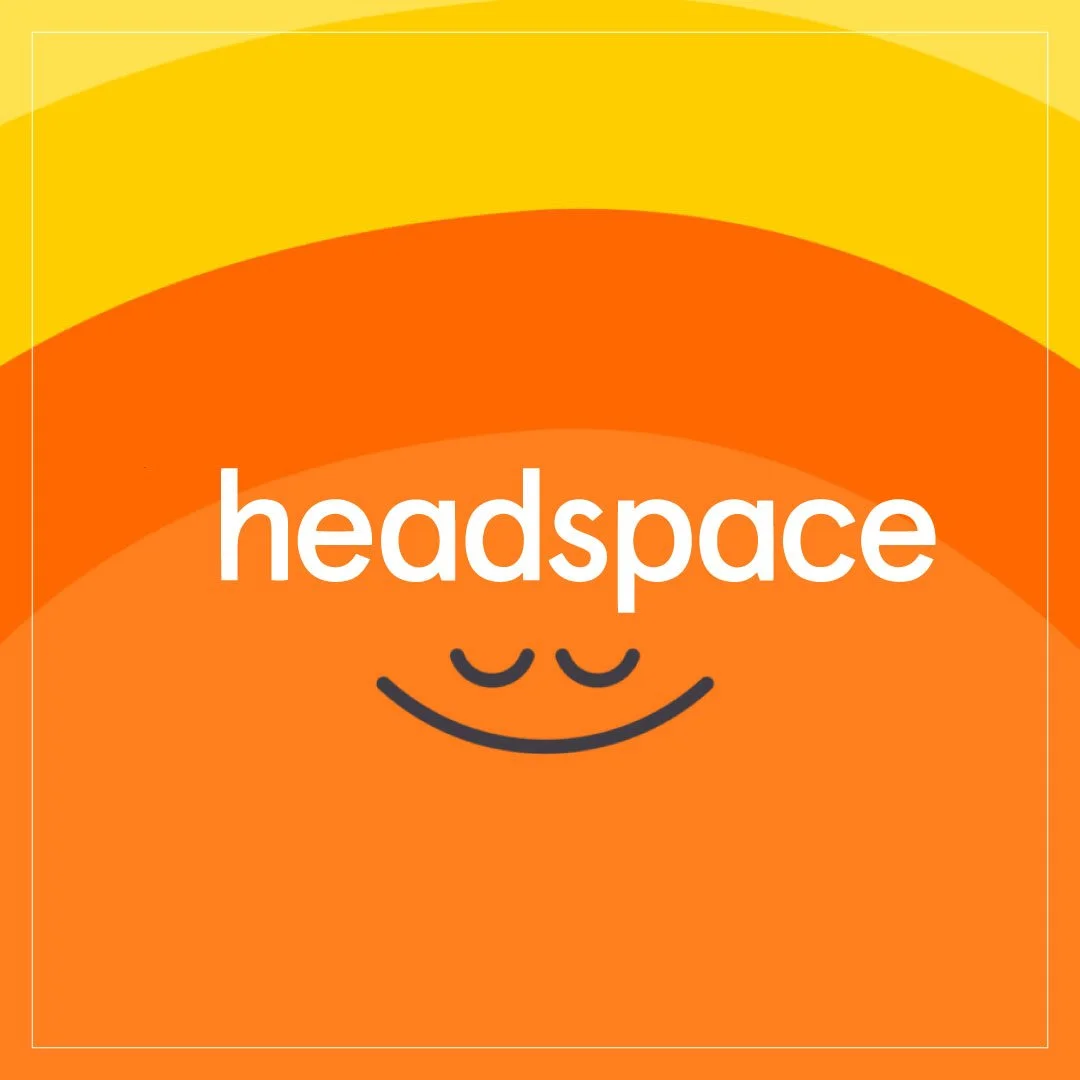 Colorful logo for Headspace featuring a smiling face with closed eyes, with a background of yellow, orange, and red gradients.