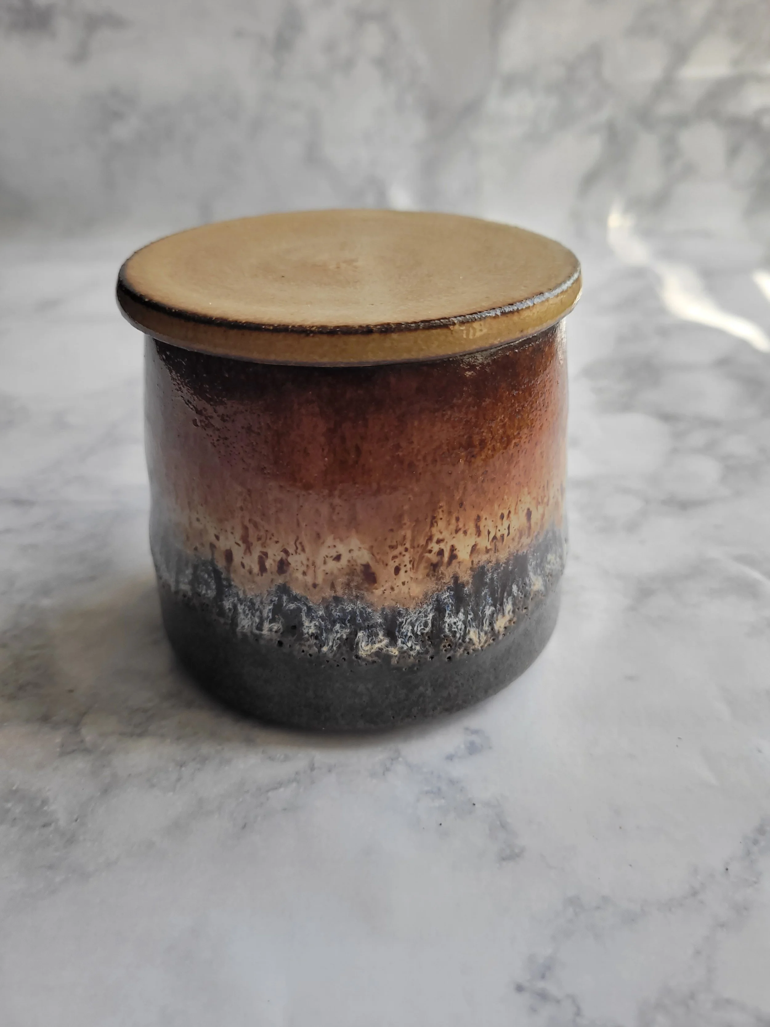 10 oz Hazelnut Jar-lid doesn't sit well.
Click  on Image to see  Oops-Pottery.