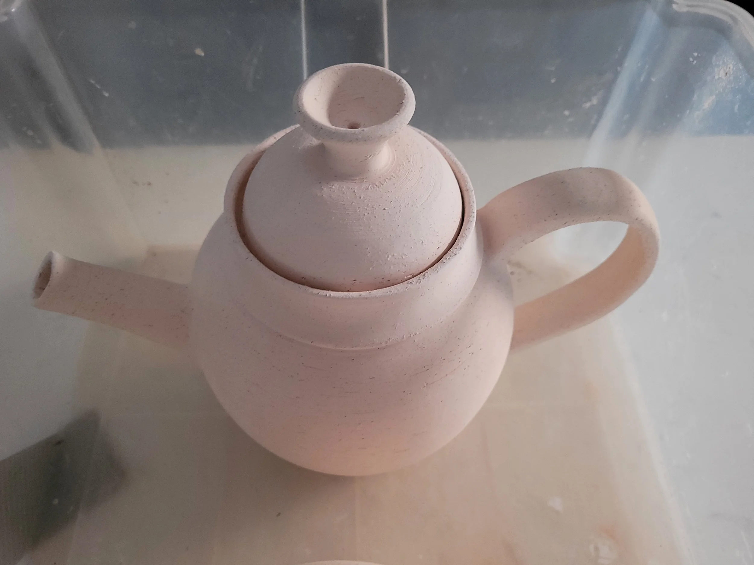 2 bisqued teapots