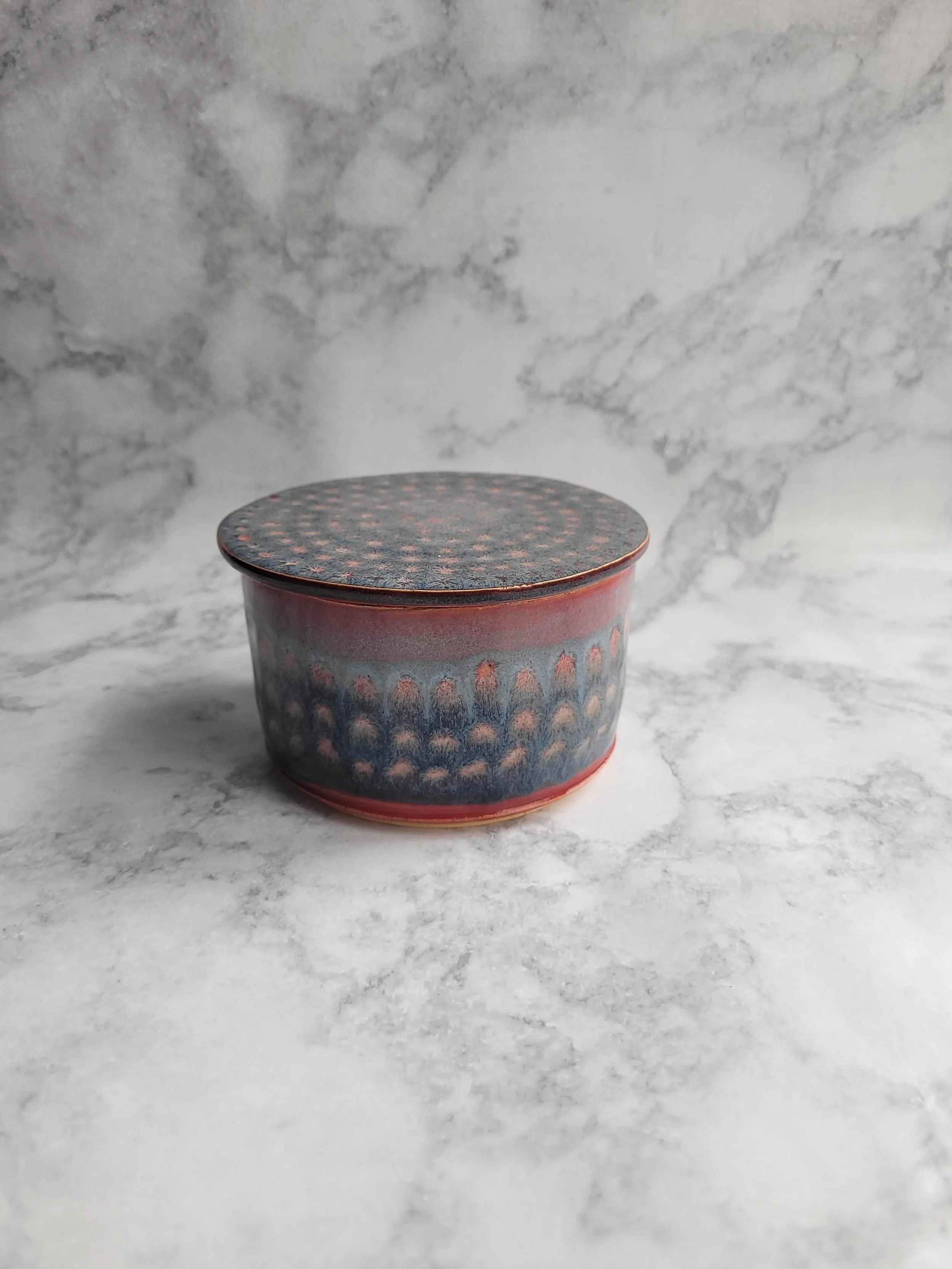 Ocean Mist Butter Keeper-lid doesn't sit well.
Click  on Image to see  Oops-Pottery.