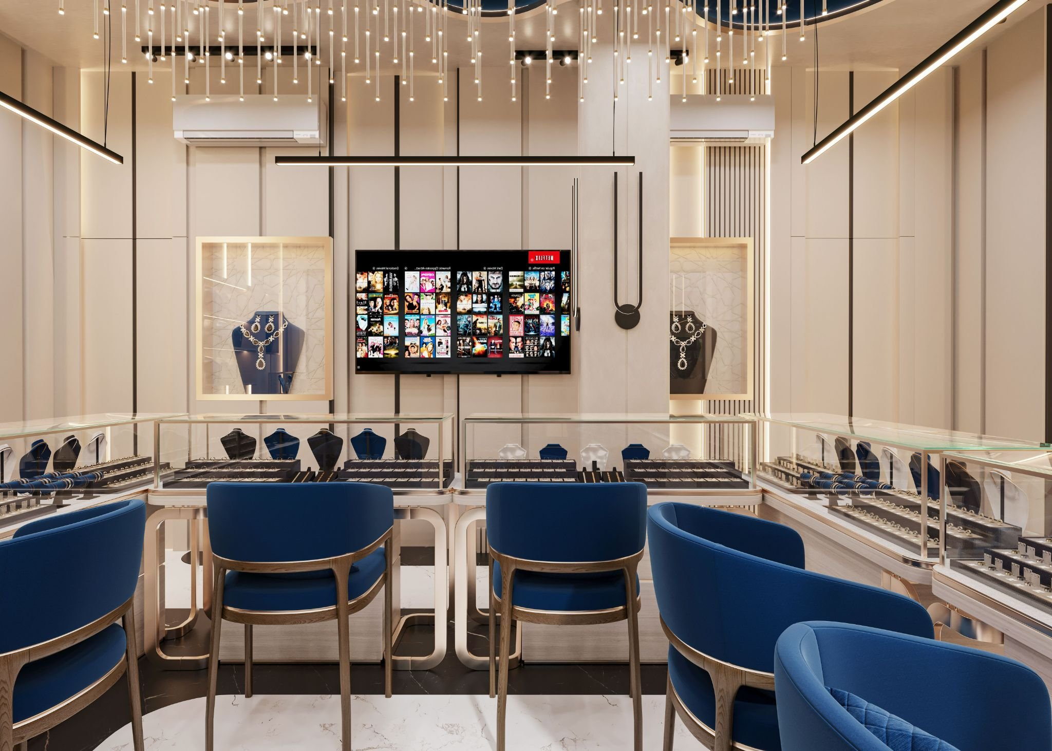 Interior view of the Michaels Jewelers bridal boutique showroom with blue velvet chairs and glass jewelry showcases