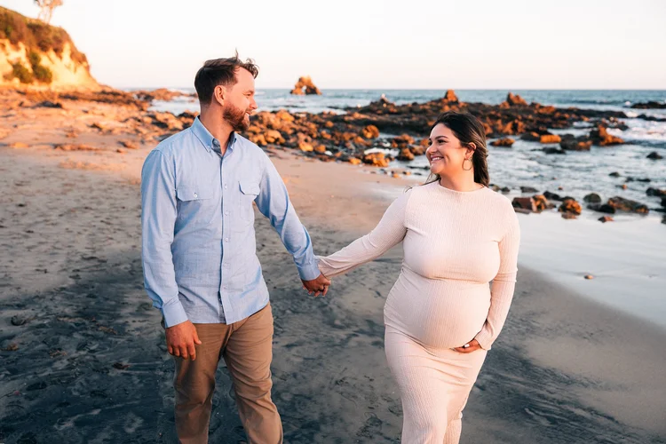 Maternity session on the sand at Little Corona del Mar in Newport Beach