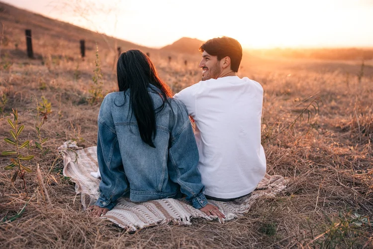 A couples session on the grassy hills of Quail Hill in Irvine