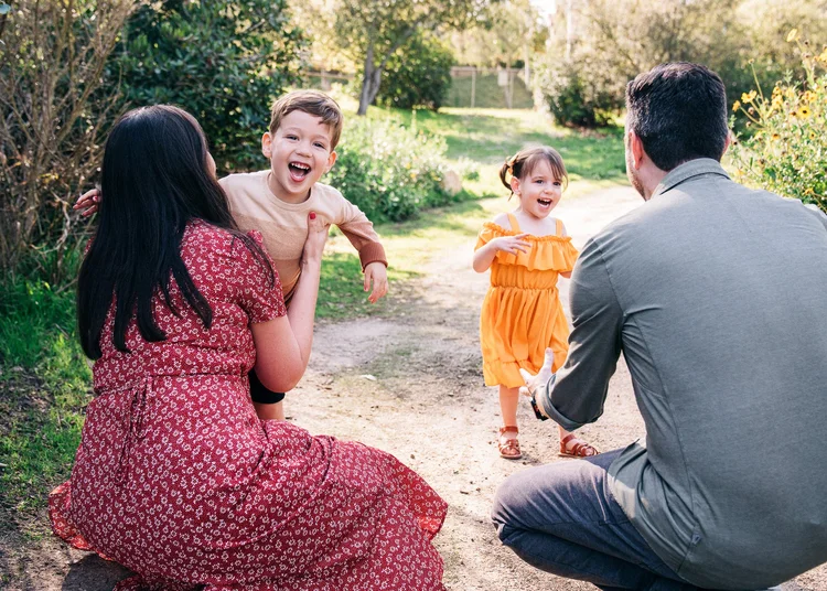 Family session at Orange County park, candid kids running and laughing