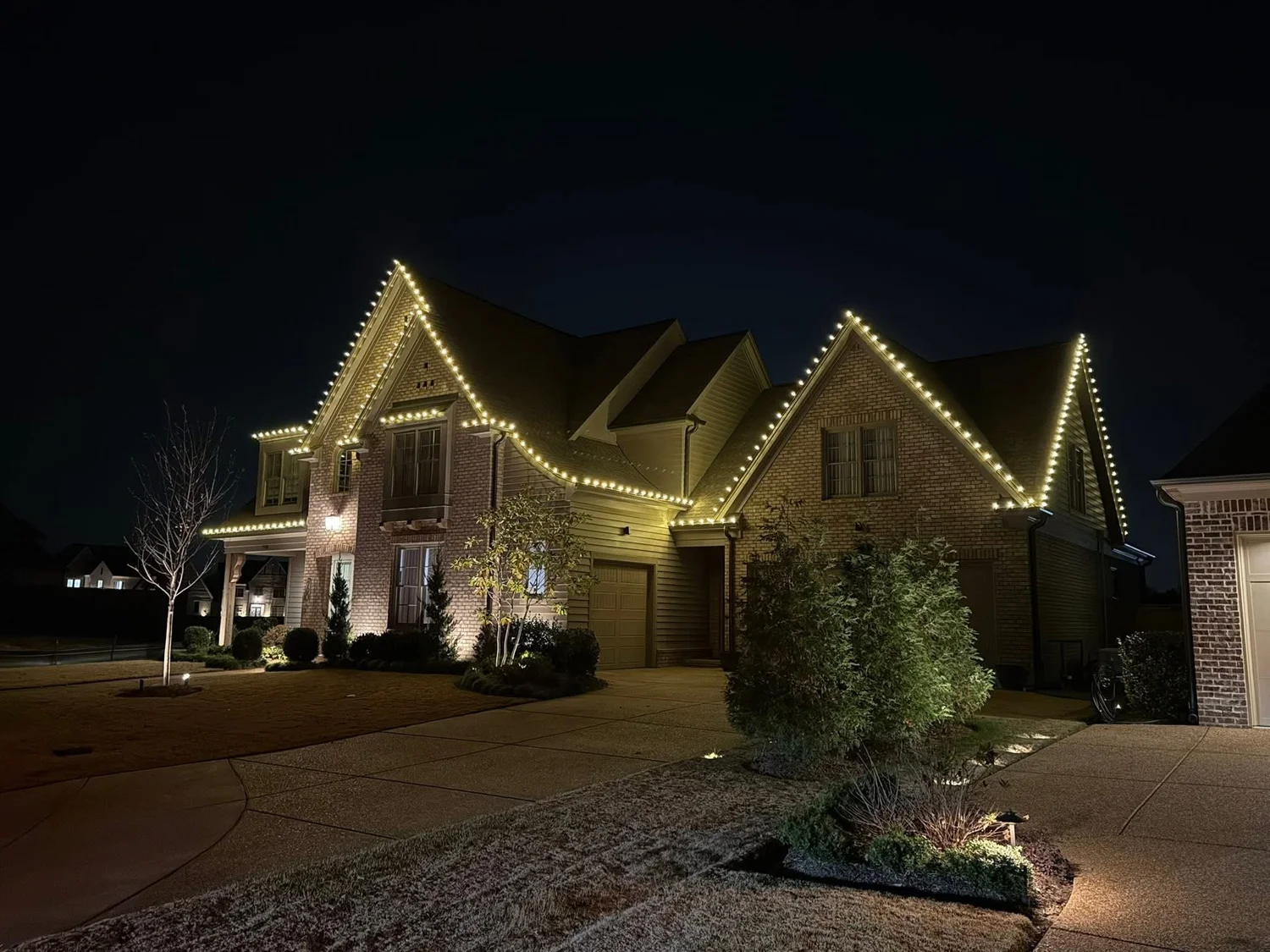 Christmas lights installed on a home in Piperton, TN