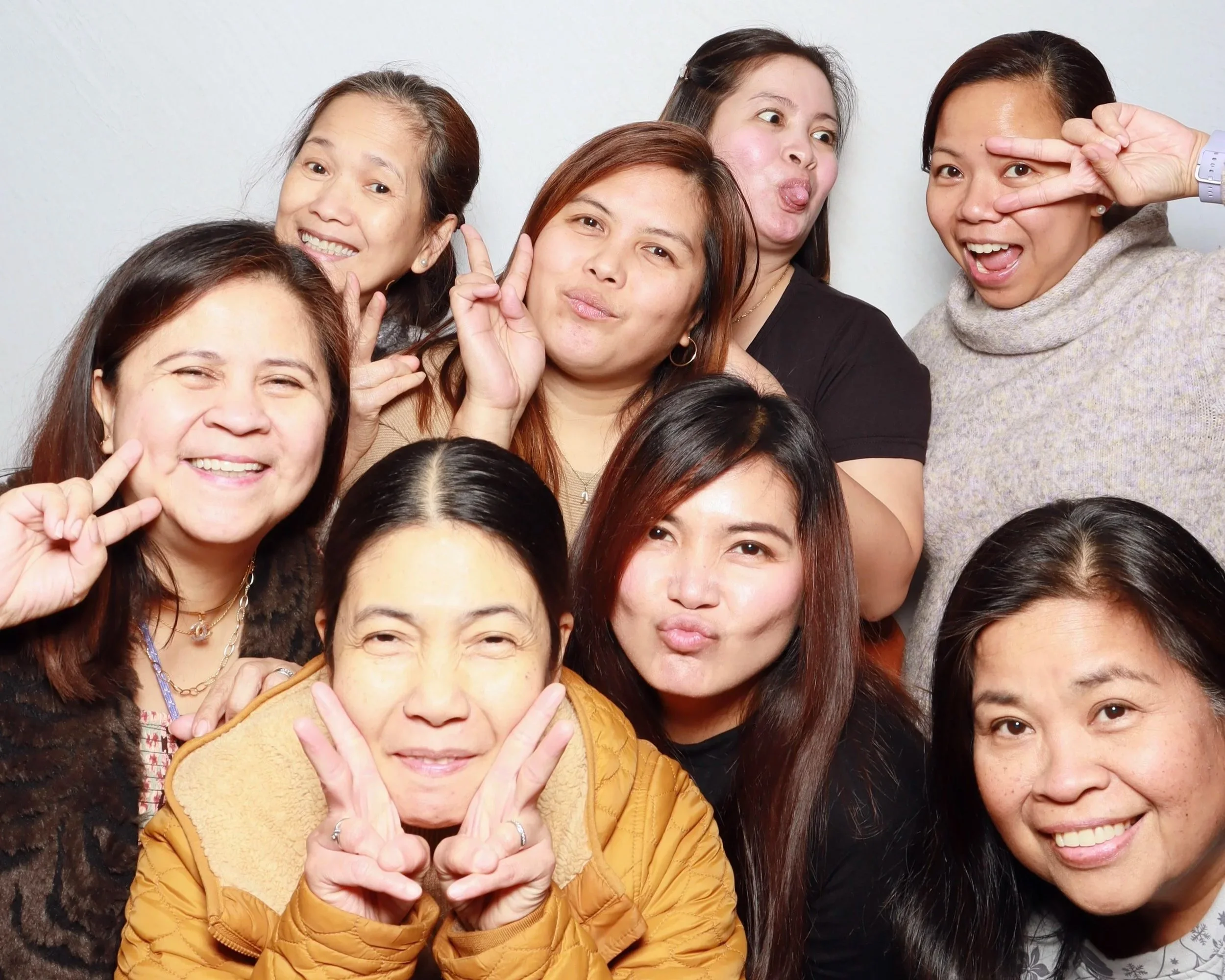 Group of women having fun using a luxurious photobooth rental experience
