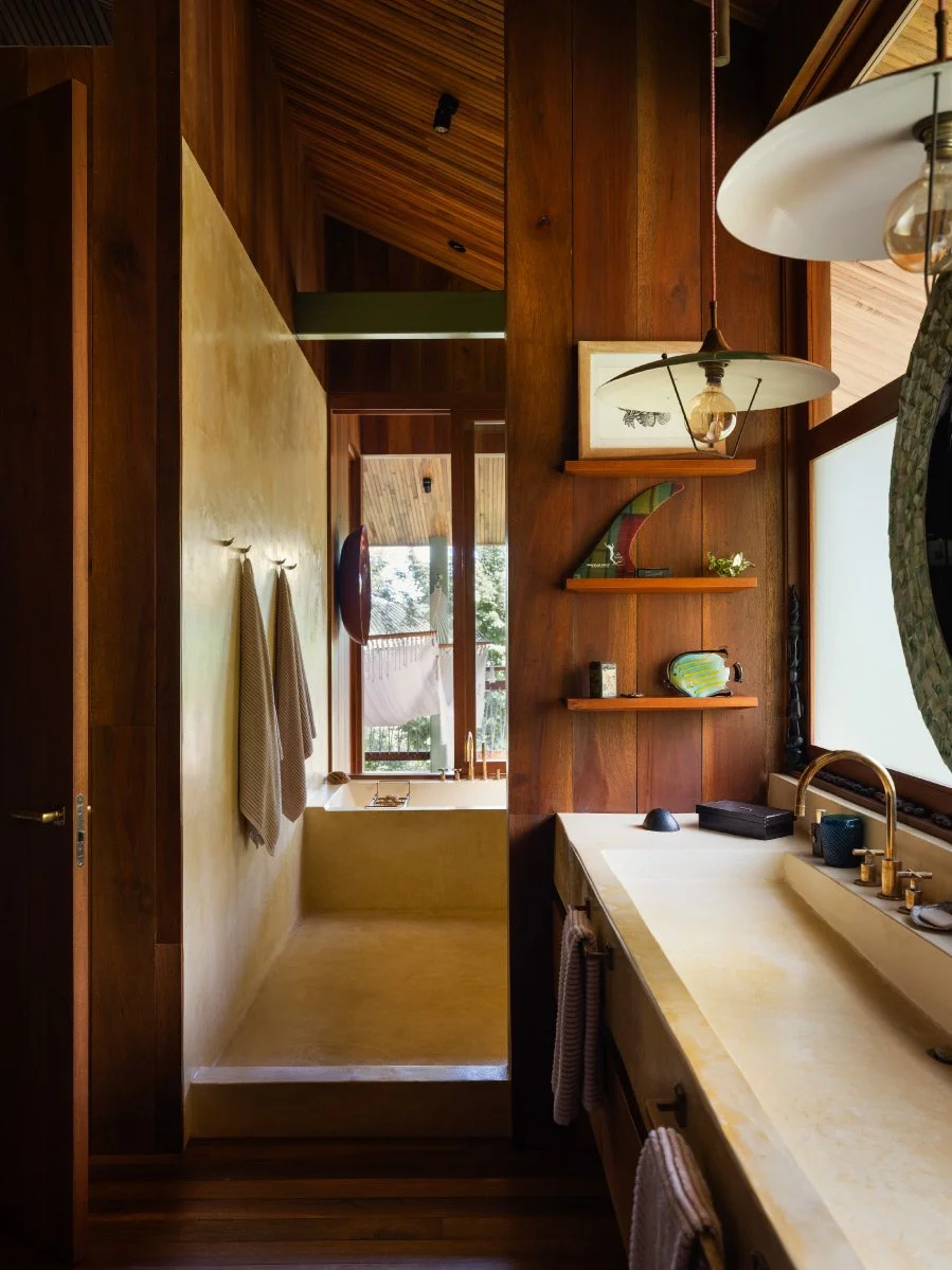Al Suave House bathroom in Santa Teresa, Costa Rica, with concrete basin and timber walls, FAMM Arquitectura
