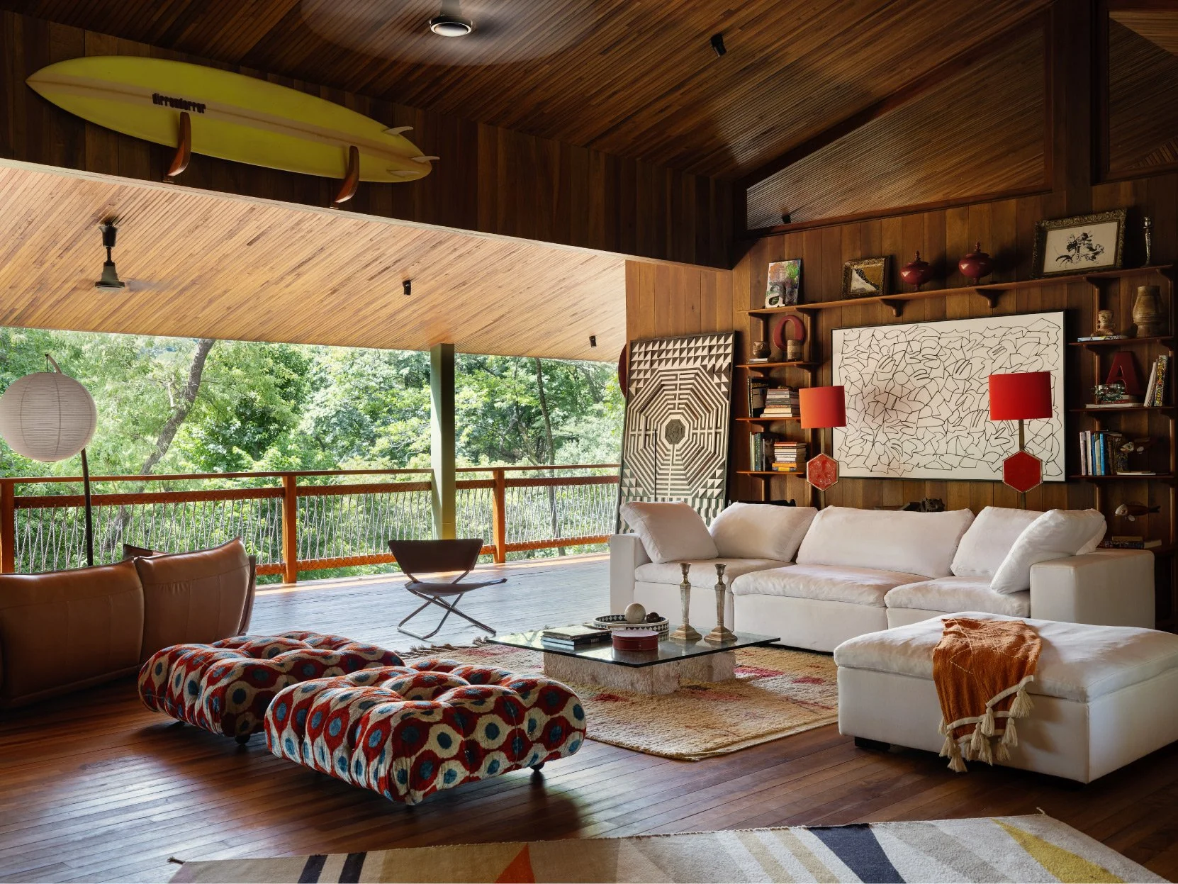 Al Suave House living room in Santa Teresa, Costa Rica, with timber ceiling, white sofa and terrace views, FAMM Arquitectura
