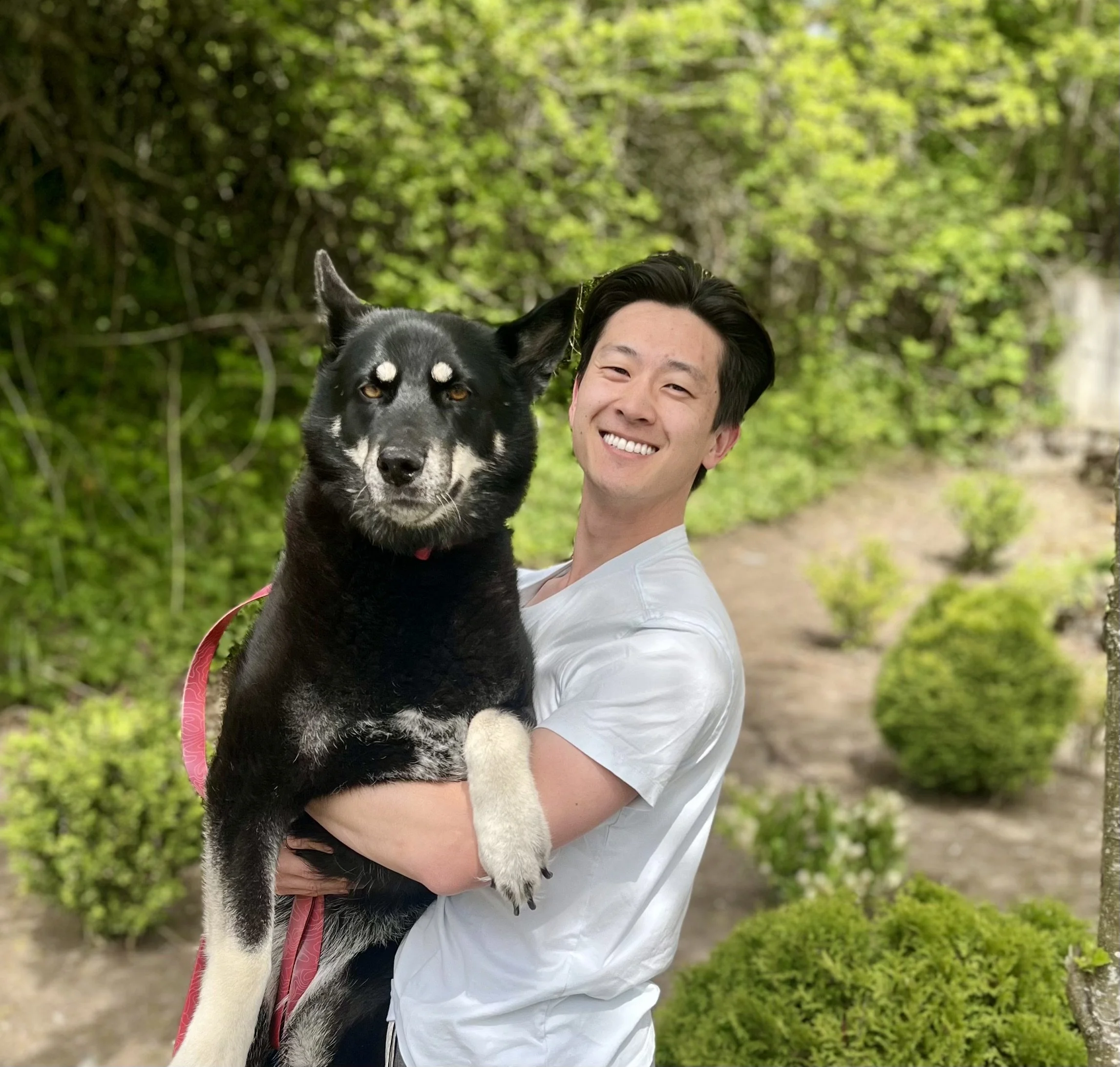 David Oh, a marriage and family therapist with his dog, Pepper.