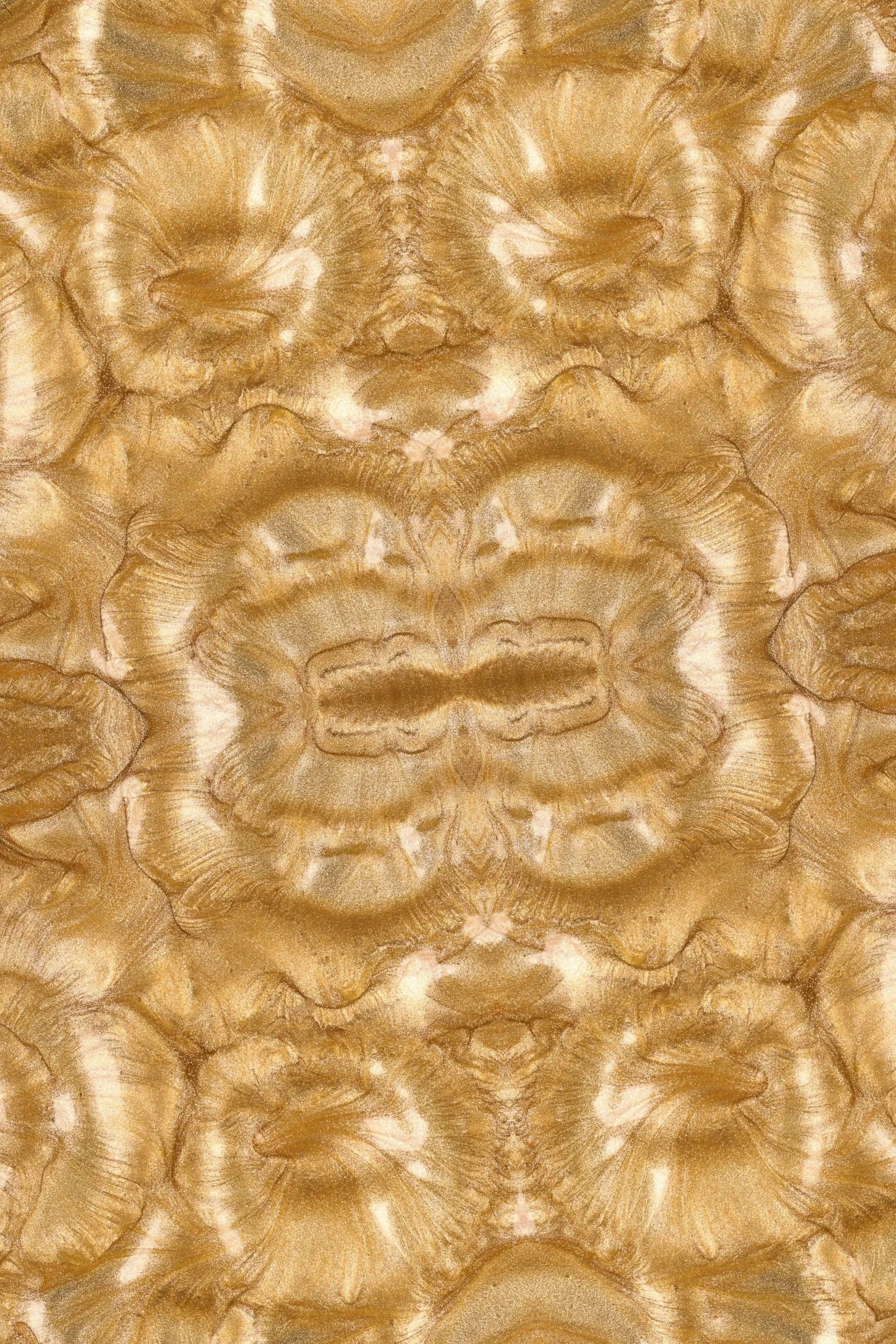 Close-up of a polished, patterned gold and white agate stone with symmetrical, layered formations.