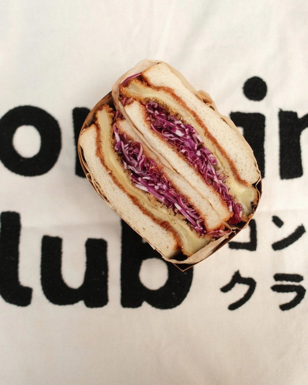 Introducing our Eggplant Sando 🍆✨

We start with our signature Japanese milk bread-baked with a touch of brown sugar for that subtle, mellow sweetness. Inside, a thick-cut eggplant katsu, breaded in coarse panko and fried to a precise golden-crisp.
