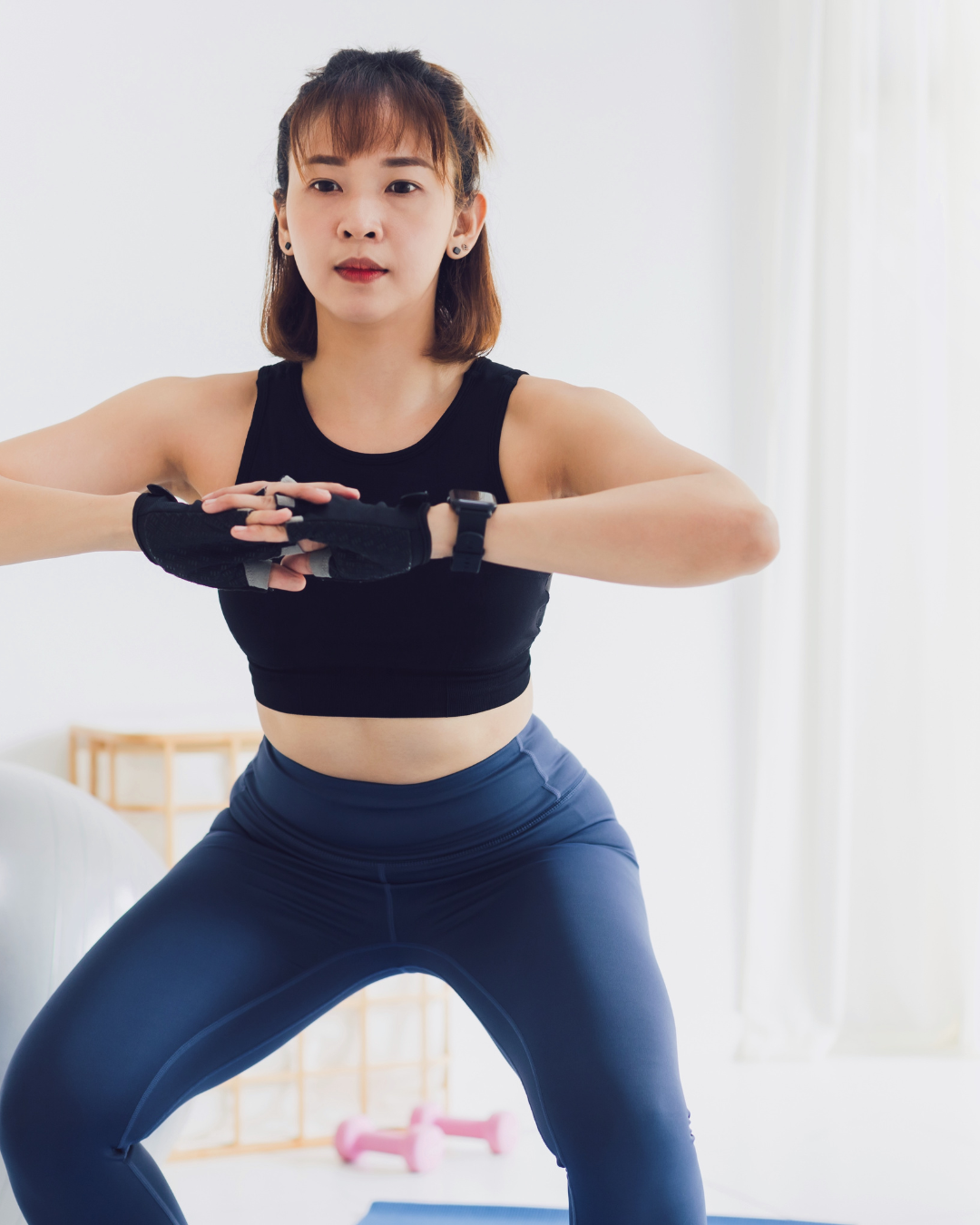Woman in workout clothes exercising