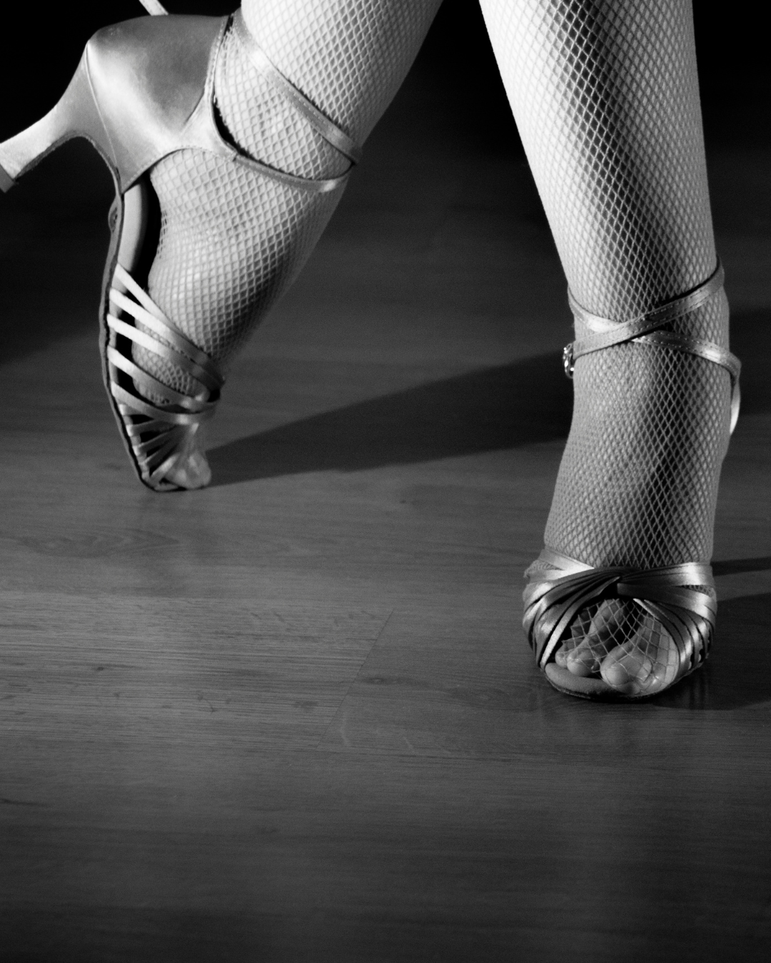 Black and white image of woman’s salsa dance shoes