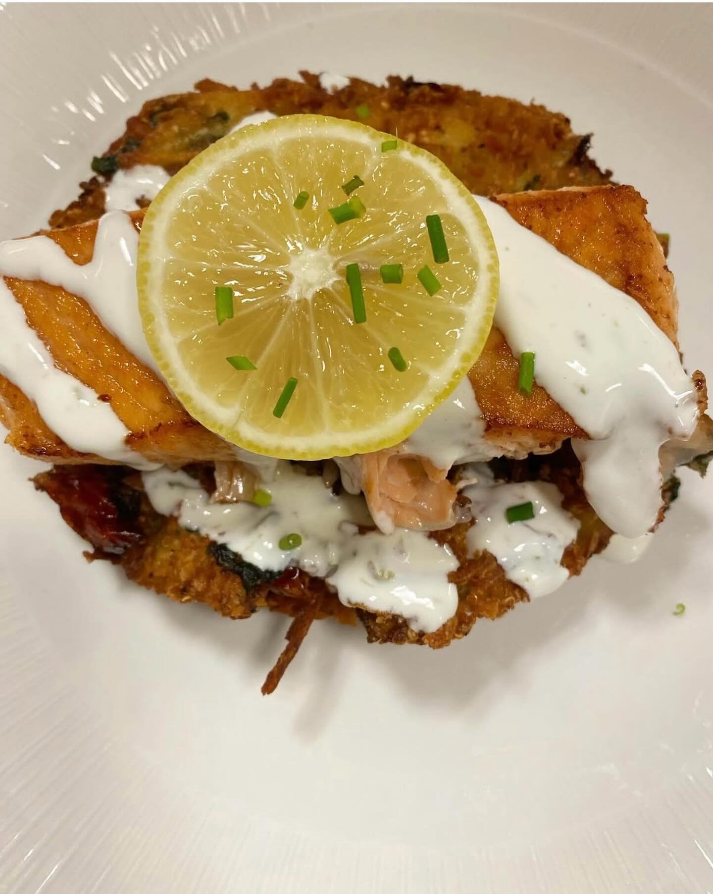 Simple ingredients. Big flavor {pan seared salmon, latke, citrus crema} till 8pm tonight | happy hour 4pm-6pm