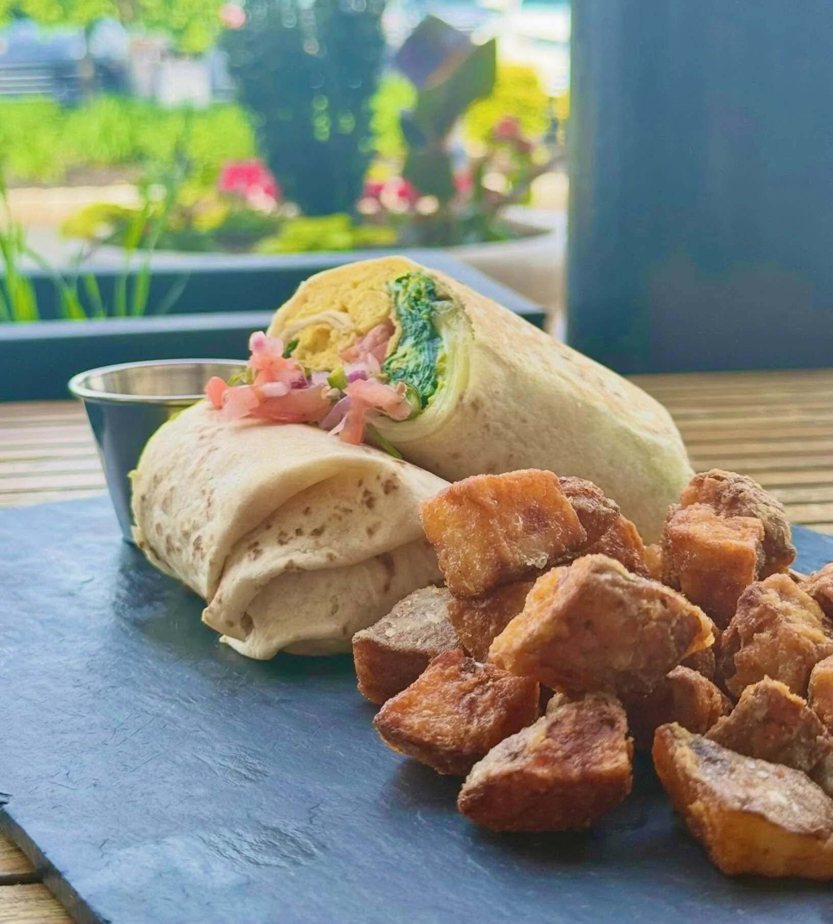 Wrapped up in all the good stuff 🌯☀️ {breakfast burrito} 

#breakfast #outside #patio #delco #avenuekitchen