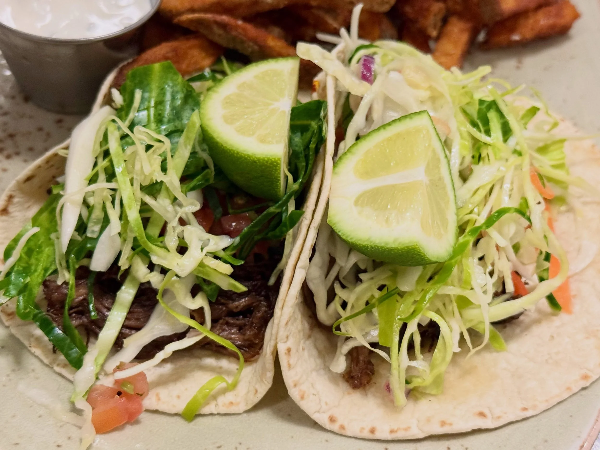 Short rib tacos, loaded with citrus slaw and dripping with flavor 🌮 

#tacotuesday #delco #avenuekitchen #phillyeats