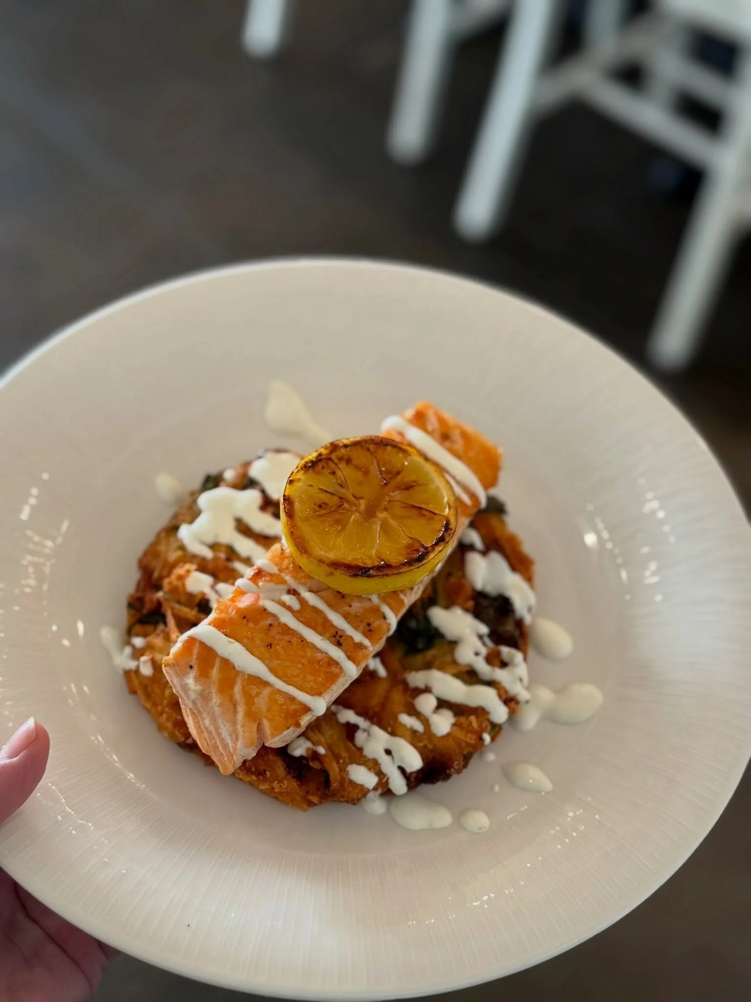 your saturday dinner plans are here📍{till 8pm} 🤍

pan seared salmon, crispy potato latke, citrus crema, charred lemon 🍋 

#avenuekitchen #glenmills #salmon #dinner  delcoeats