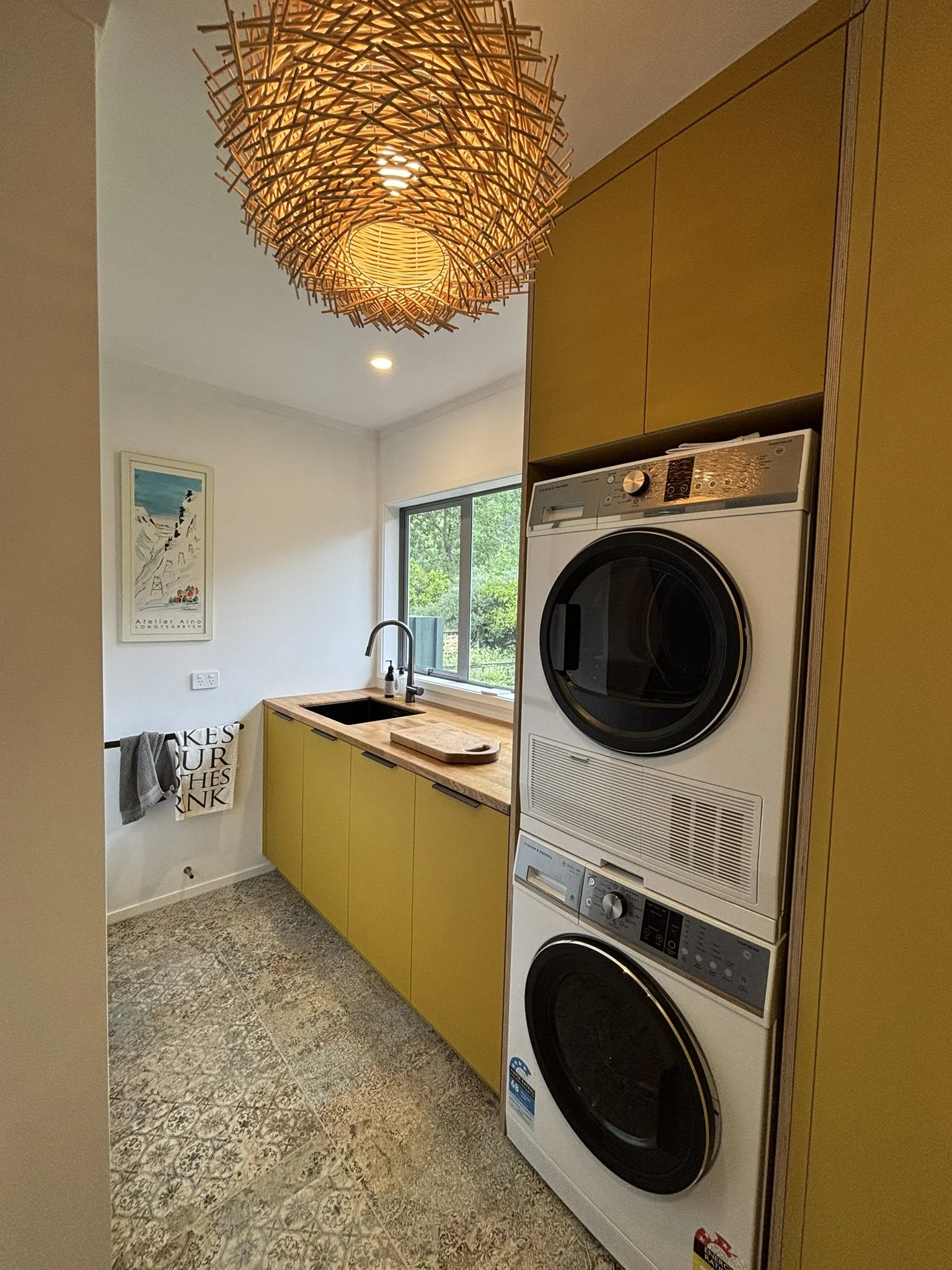 Washer dryer tower cabinetry – Far North