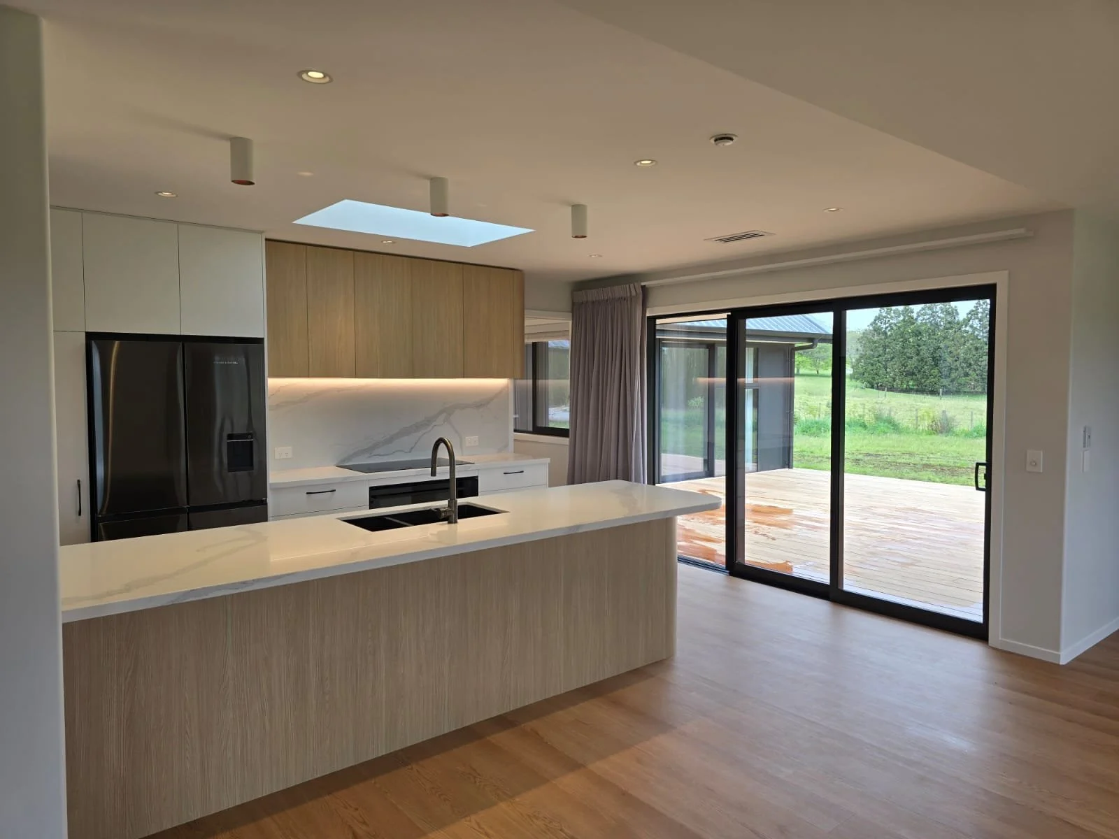 Melteca kitchen cabinetry with stone tops – Far North